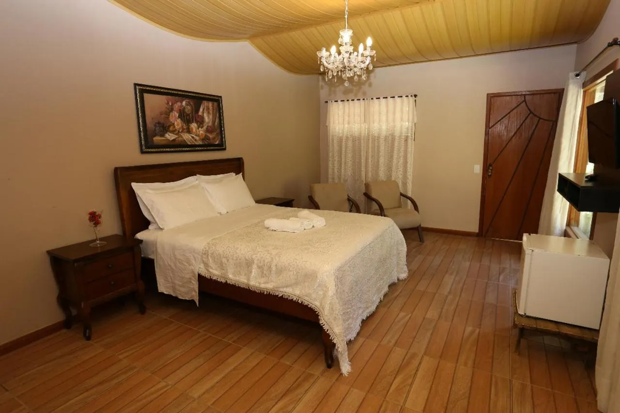 Bed in Pousada Lisieux