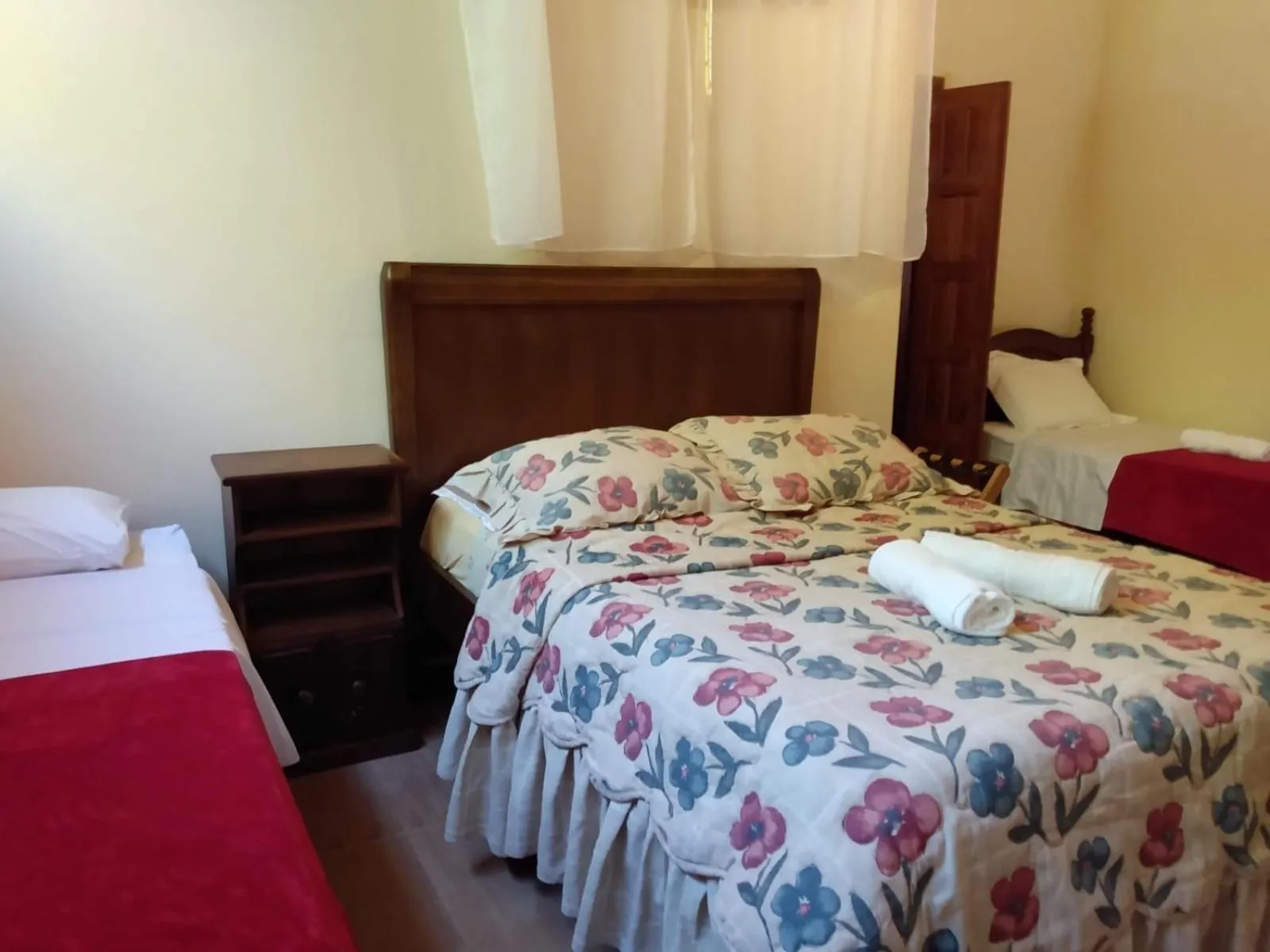 Photo of the whole room, Bed in Pousada Lisieux