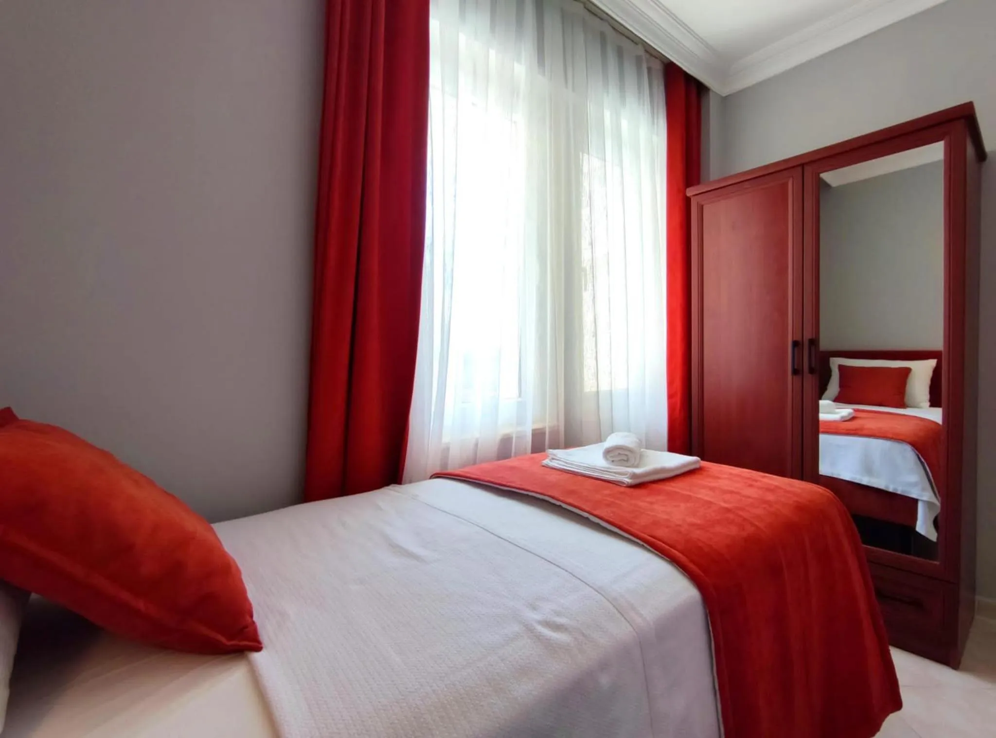 Bedroom in Gold Lion Apart Hotel