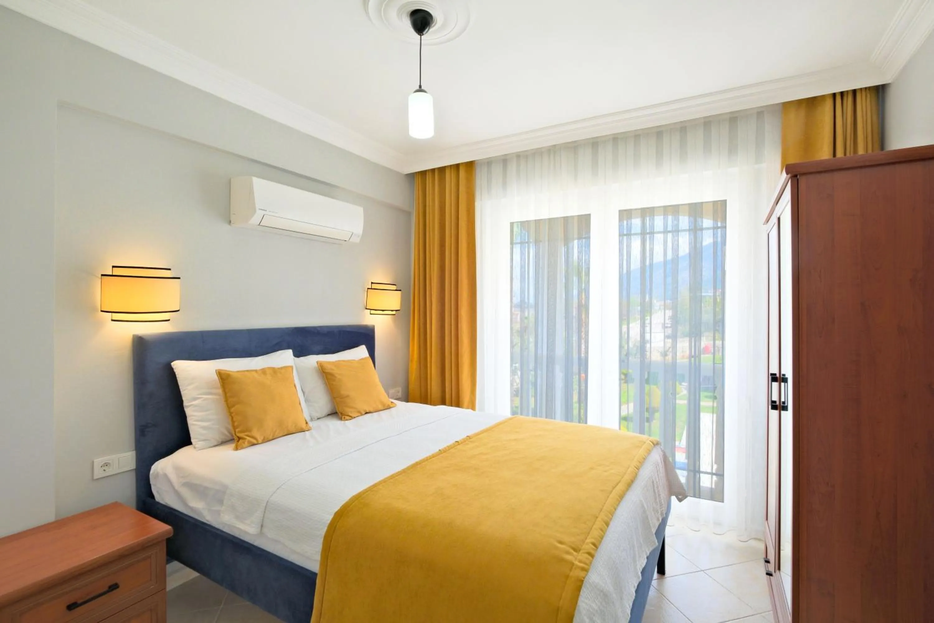 Bedroom in Gold Lion Apart Hotel