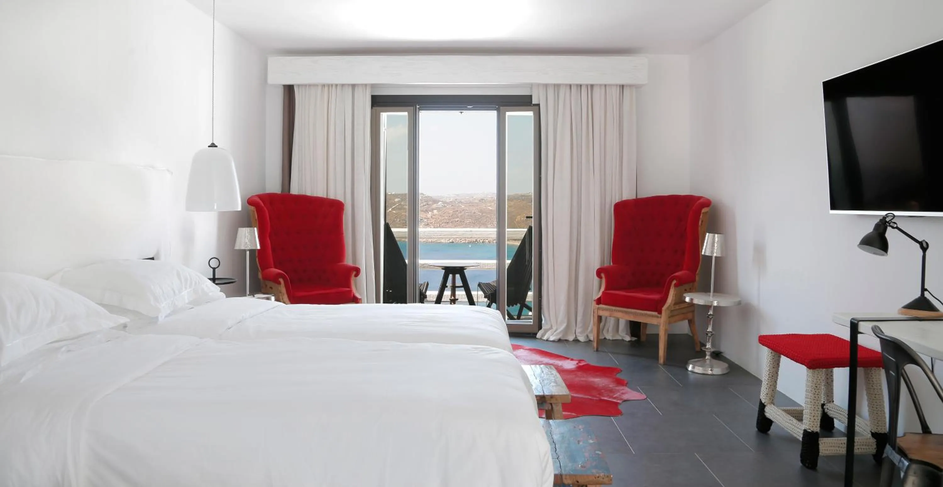 Bed in Myconian Avaton, a Member of Design Hotels