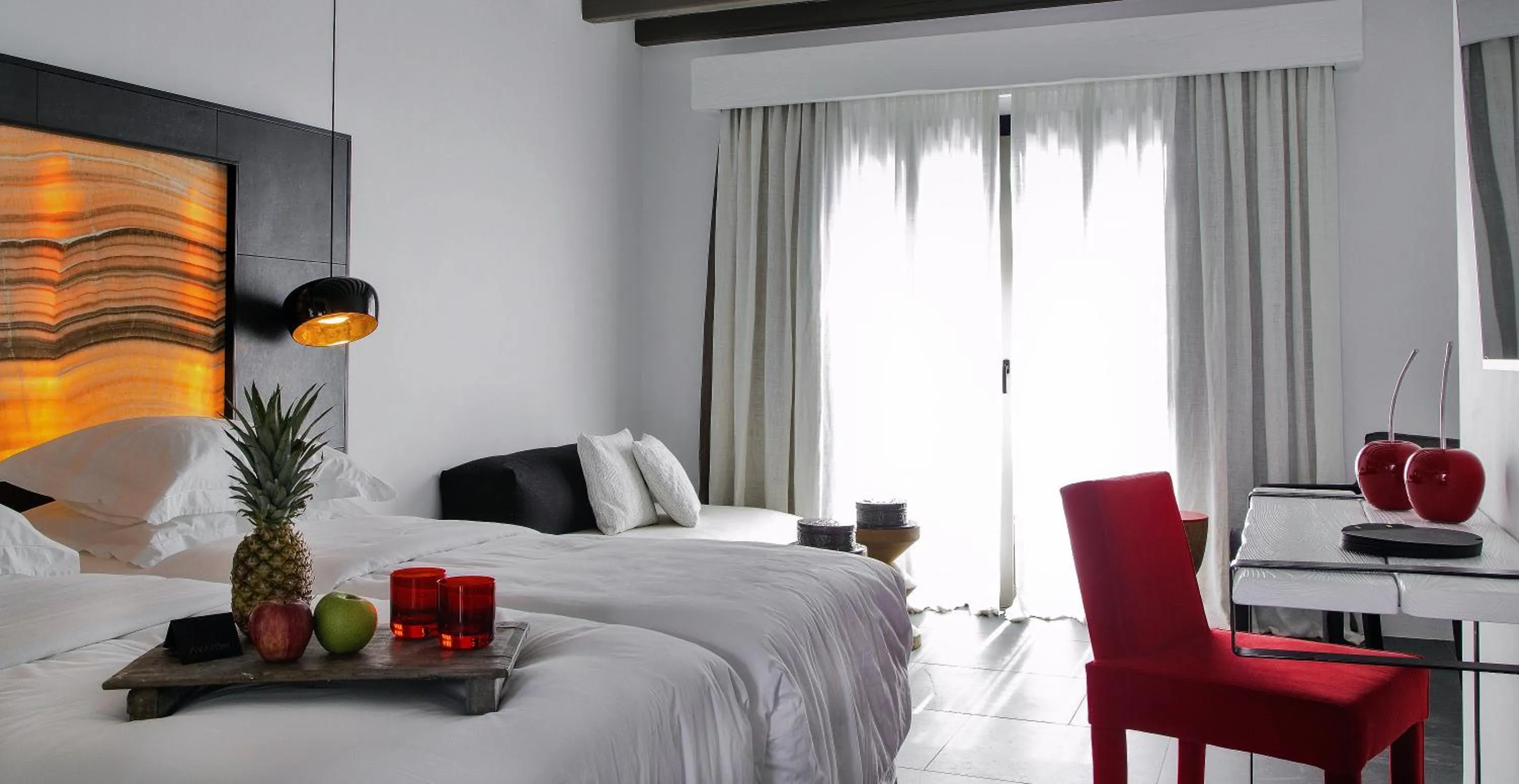 Bed in Myconian Avaton, a Member of Design Hotels