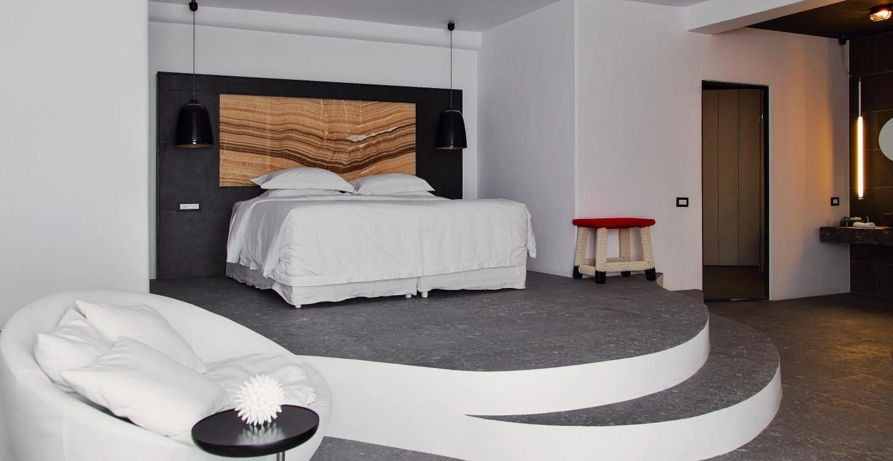 Bed in Myconian Avaton, a Member of Design Hotels