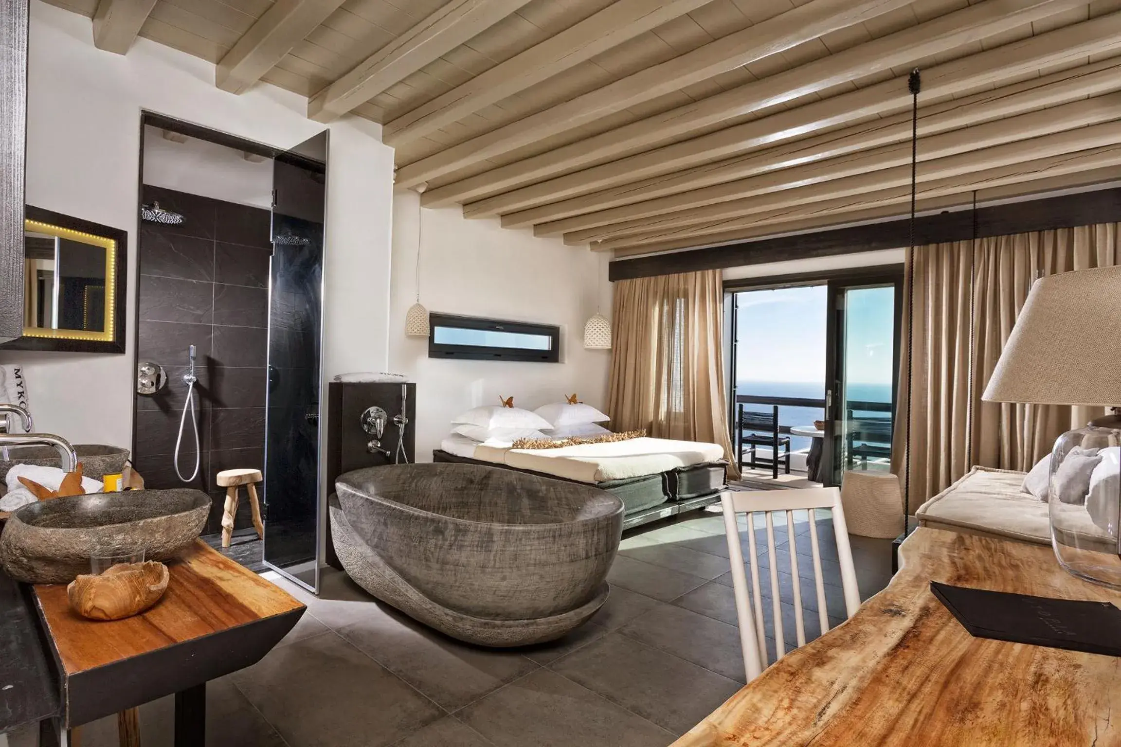 Bedroom in Myconian Utopia Relais & Chateaux Bedroom in Myconian Utopia Relais & Chateaux