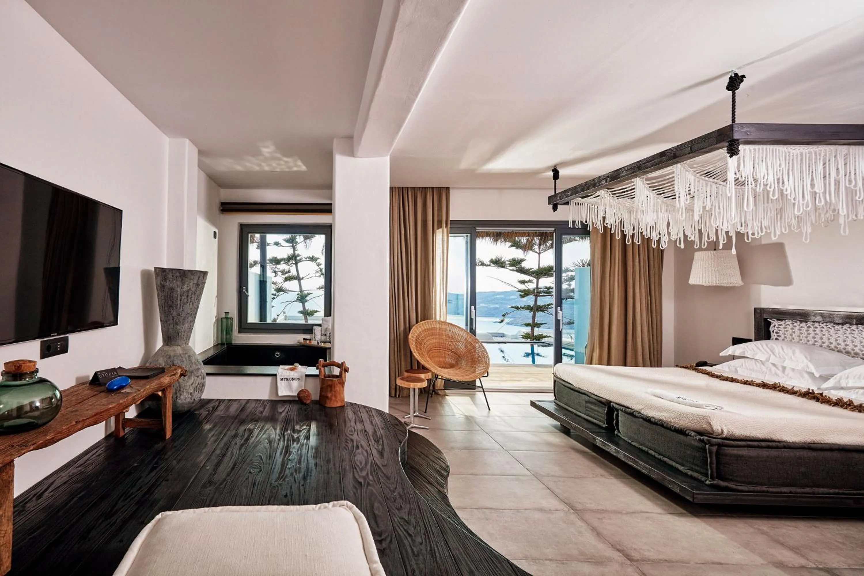 Bed in Myconian Utopia Relais & Chateaux