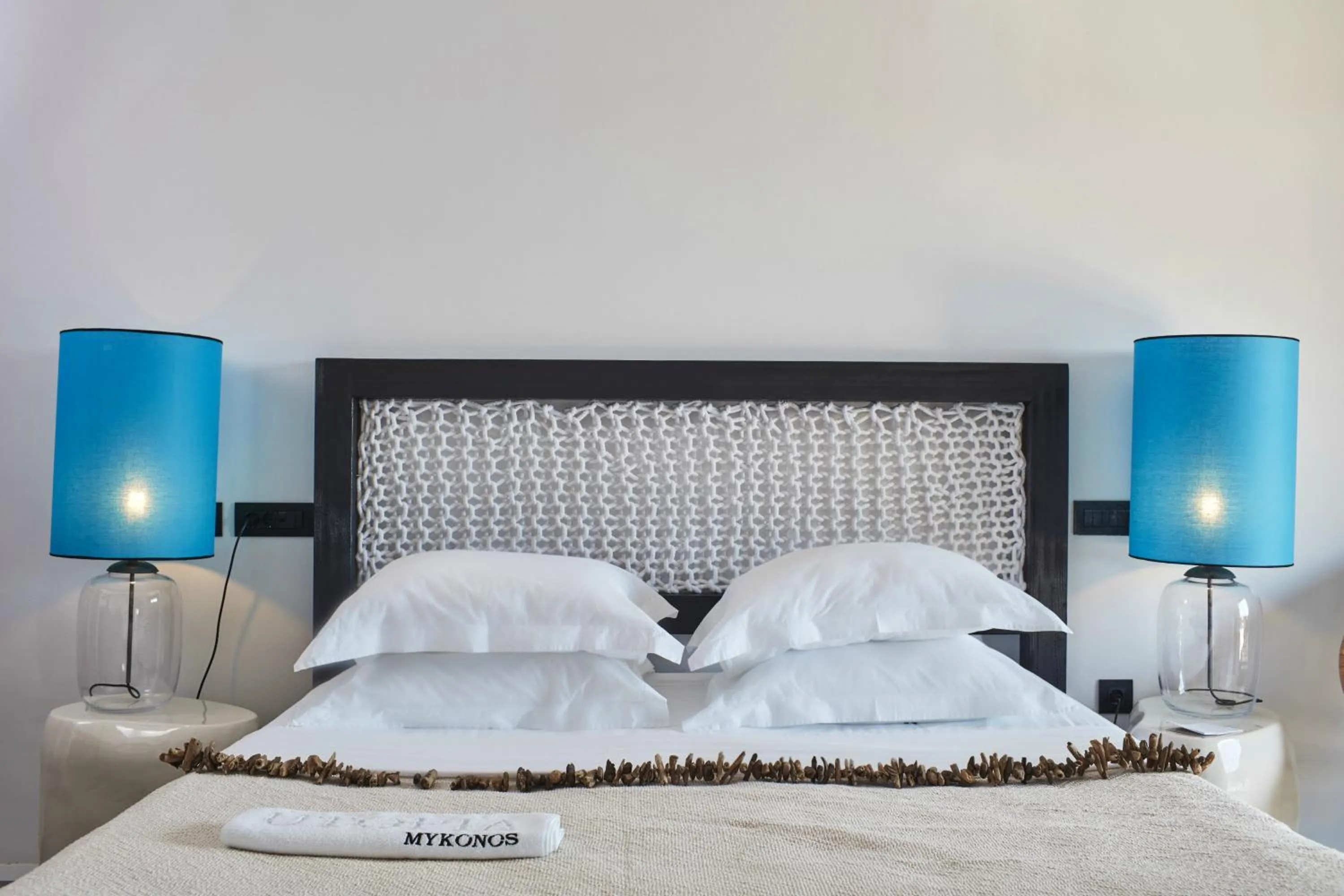 Bed in Myconian Utopia Relais & Chateaux