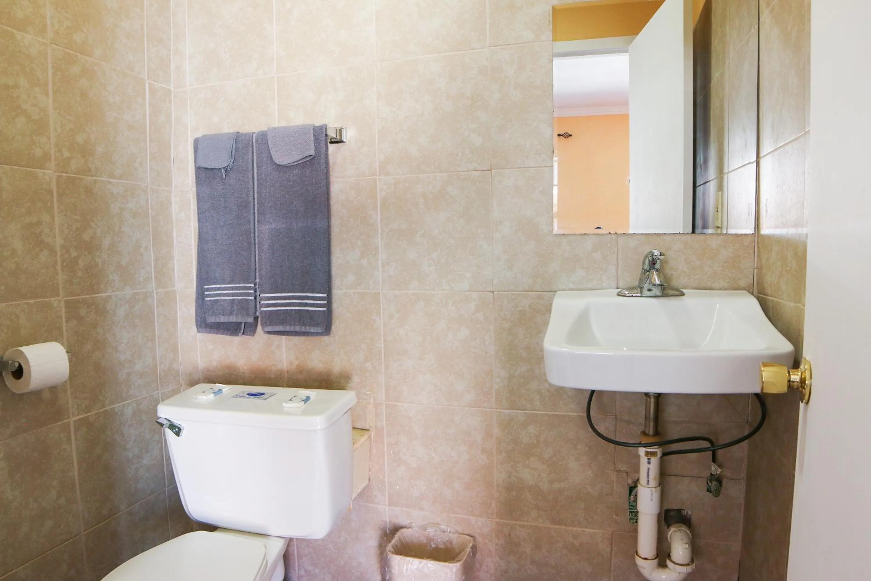 Bathroom in Economy Inn By OYO Lockport near Houma