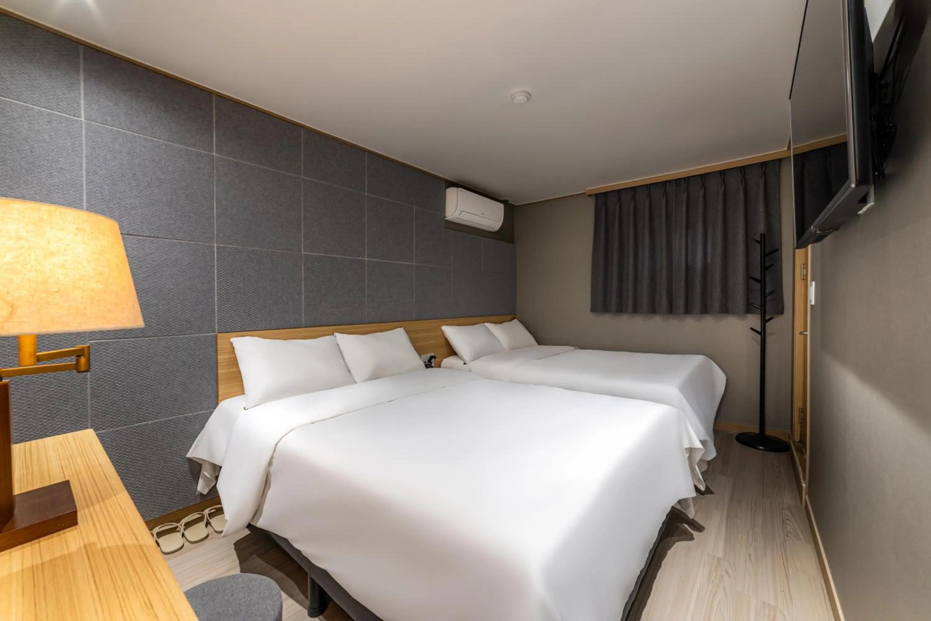 Bed in About Stay Seoul