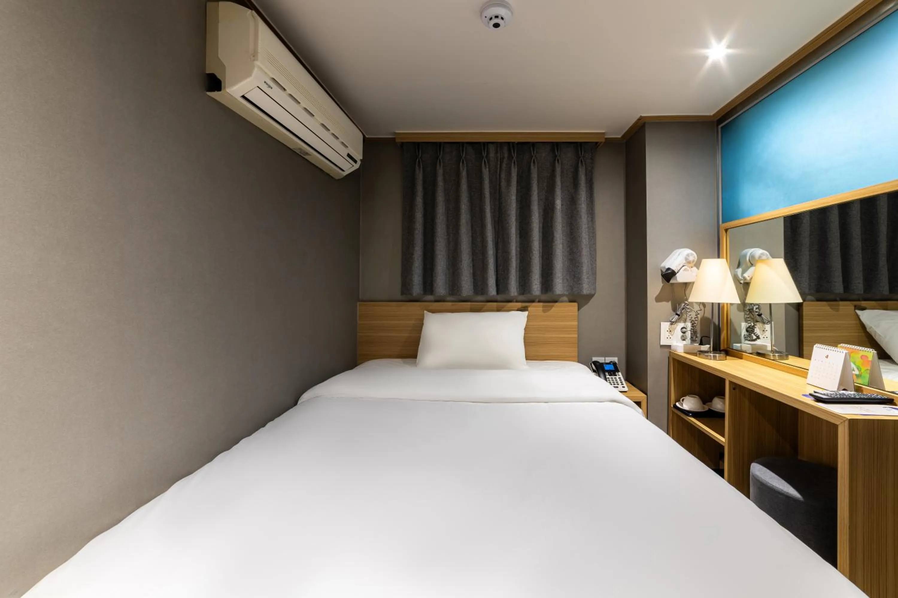 Bed in About Stay Seoul