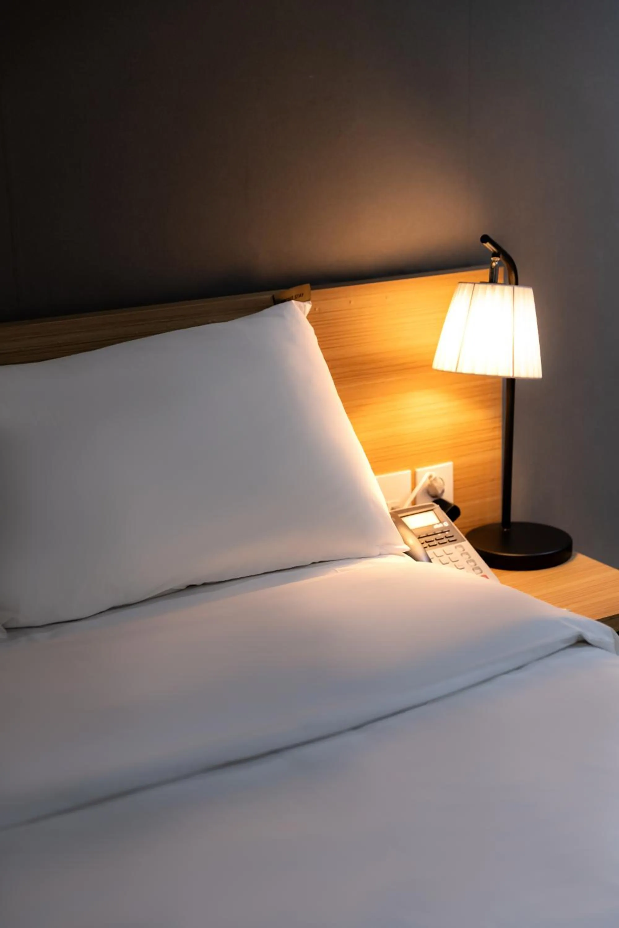 Bed in About Stay Seoul