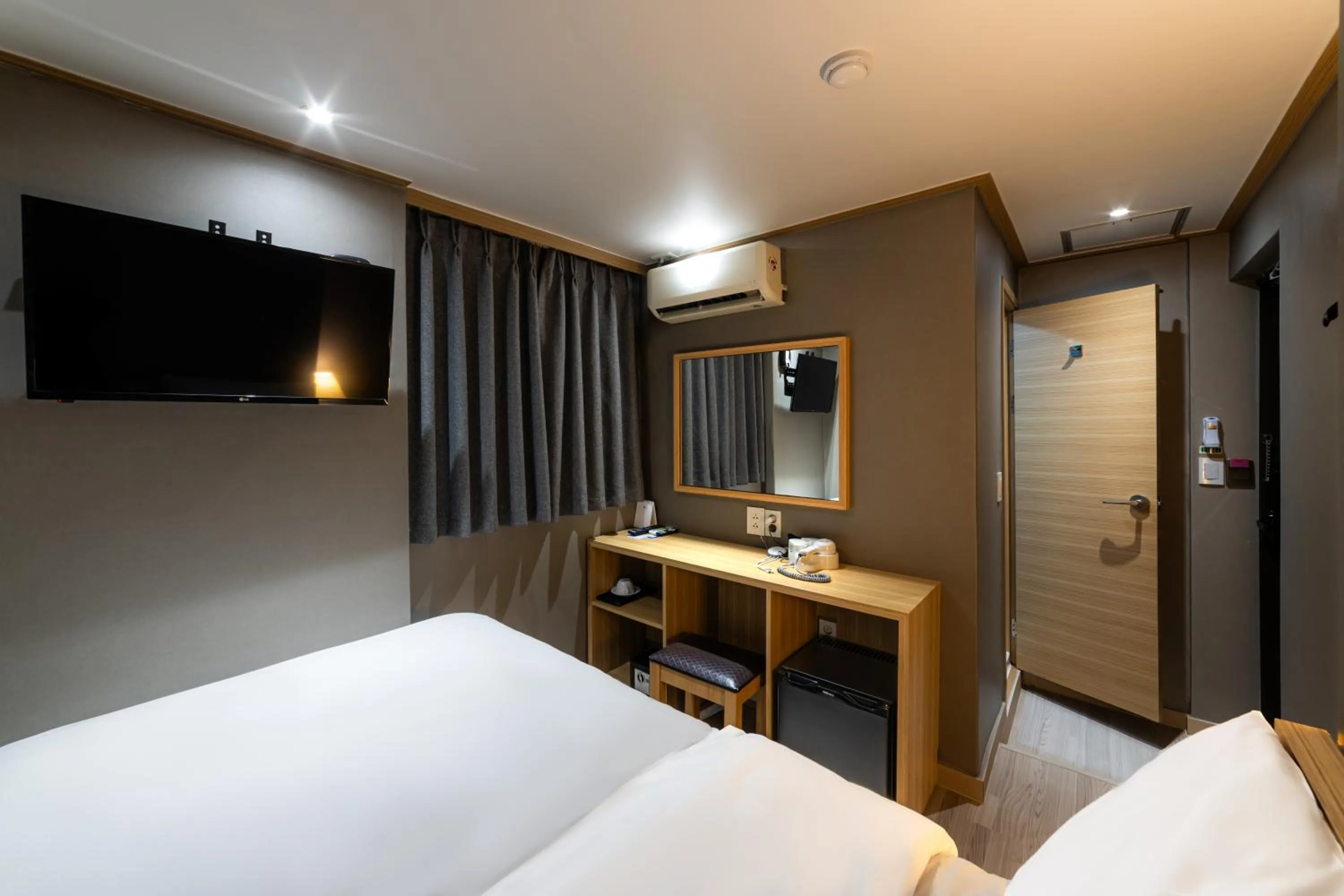 Bed in About Stay Seoul
