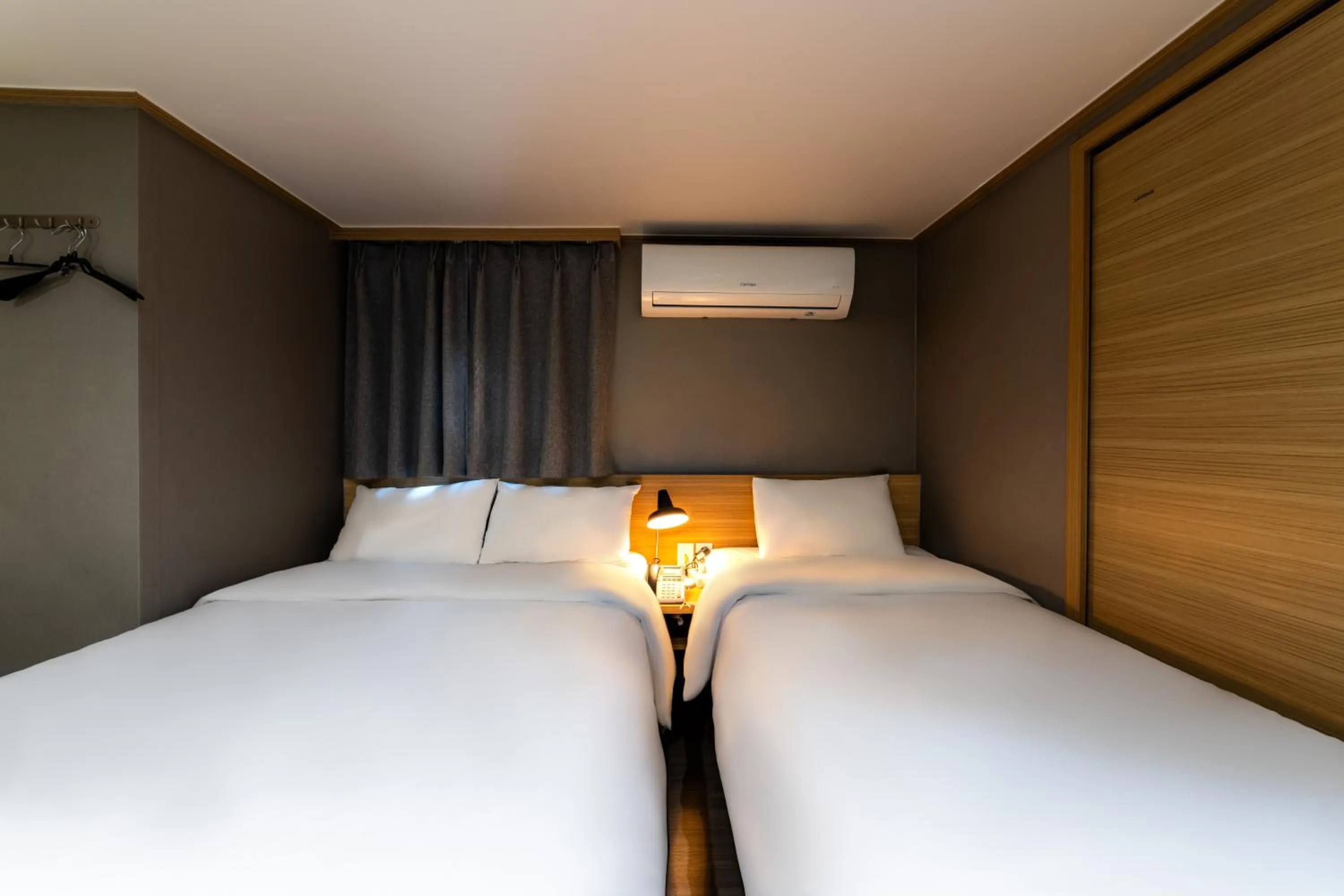 Bed in About Stay Seoul