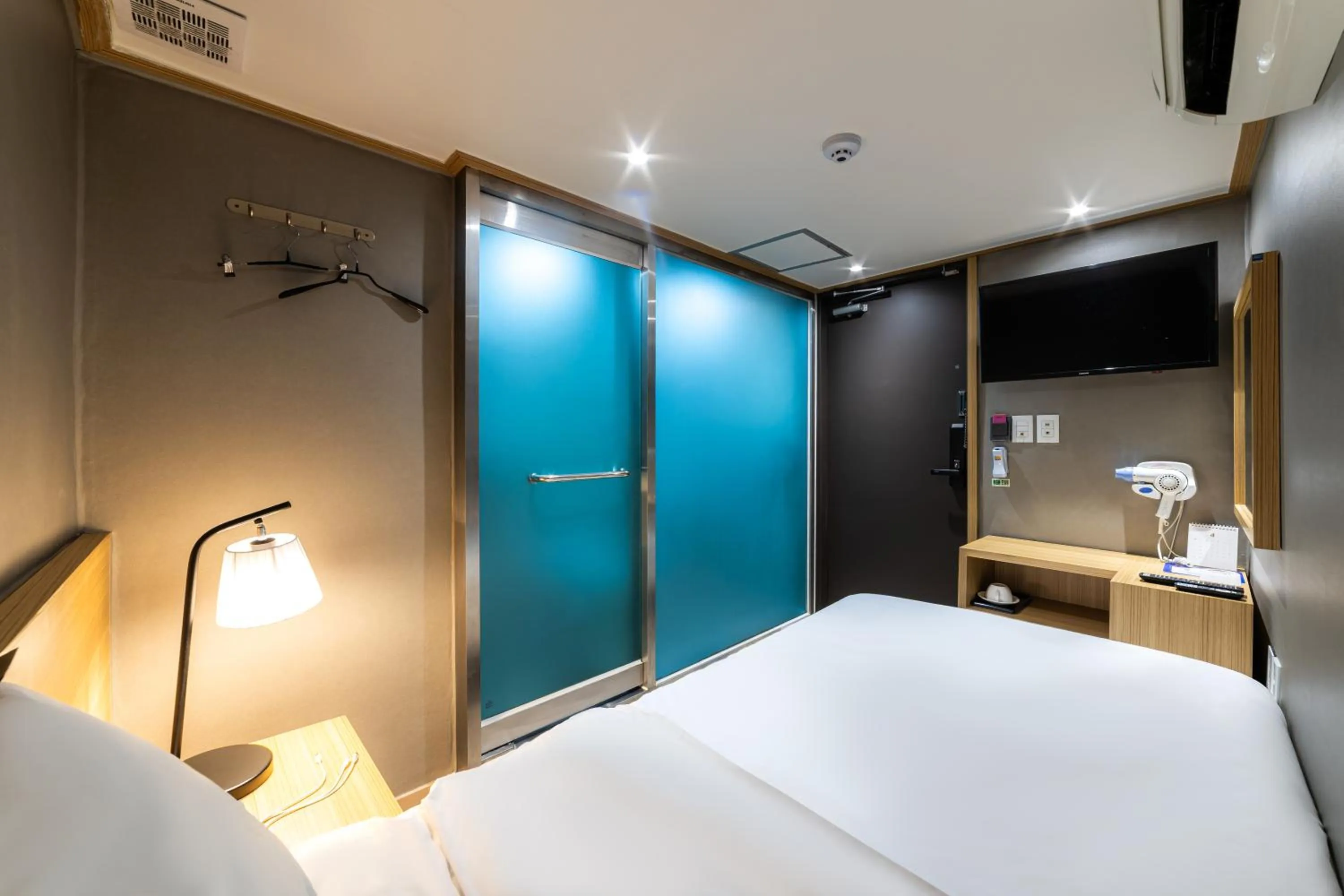 Bed in About Stay Seoul