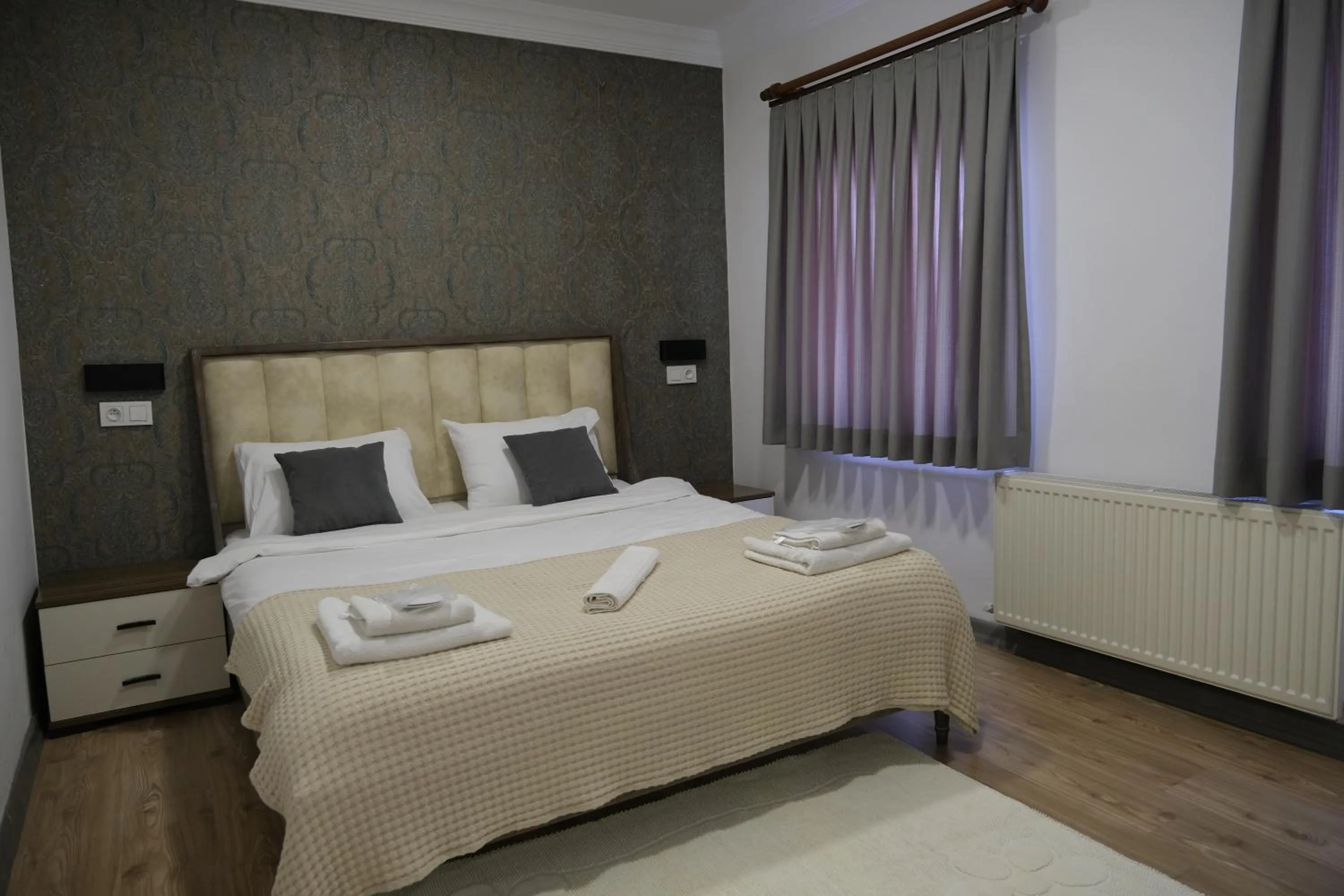 Bed in Taksim Neo Pera Suites