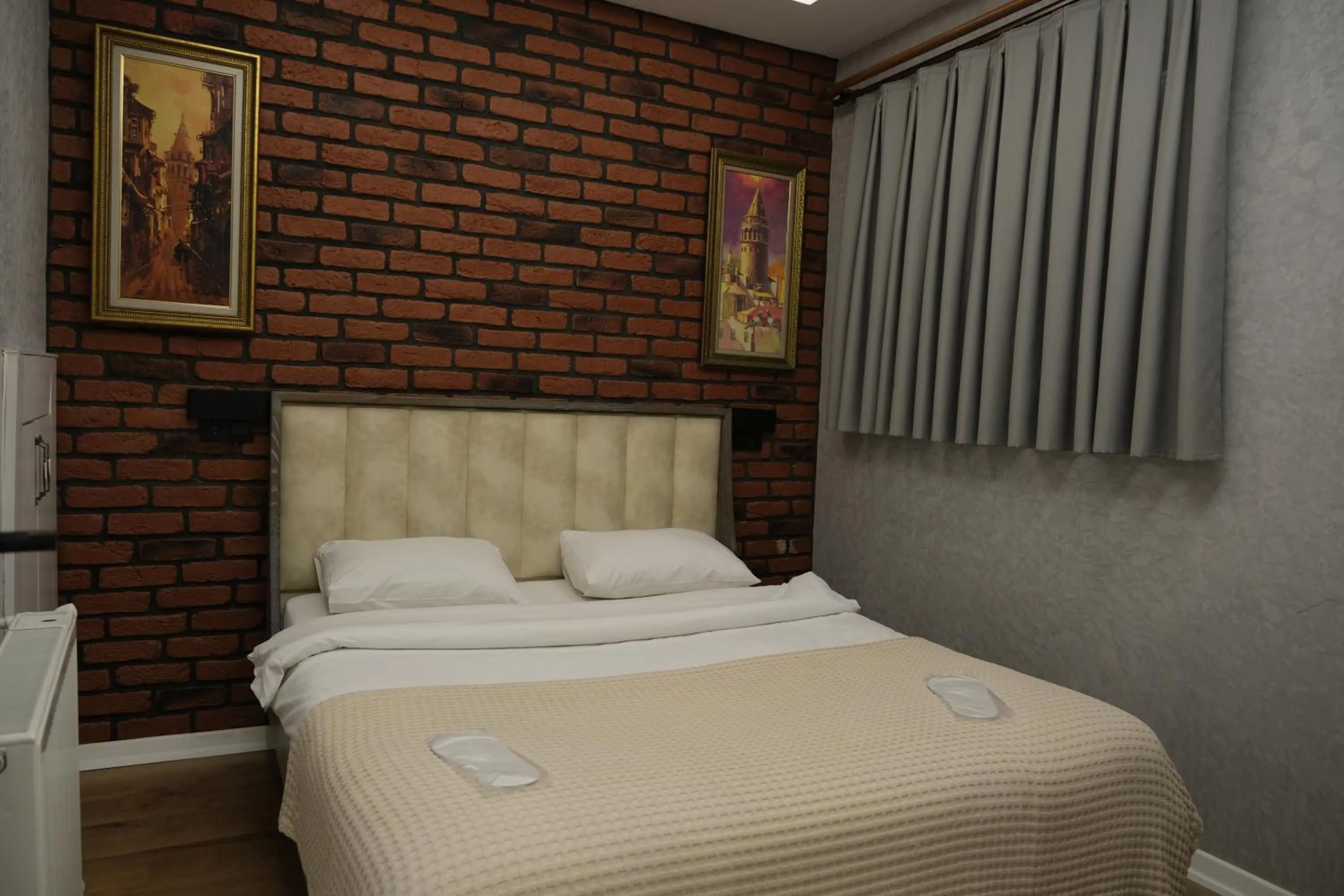 Bed in Taksim Neo Pera Suites