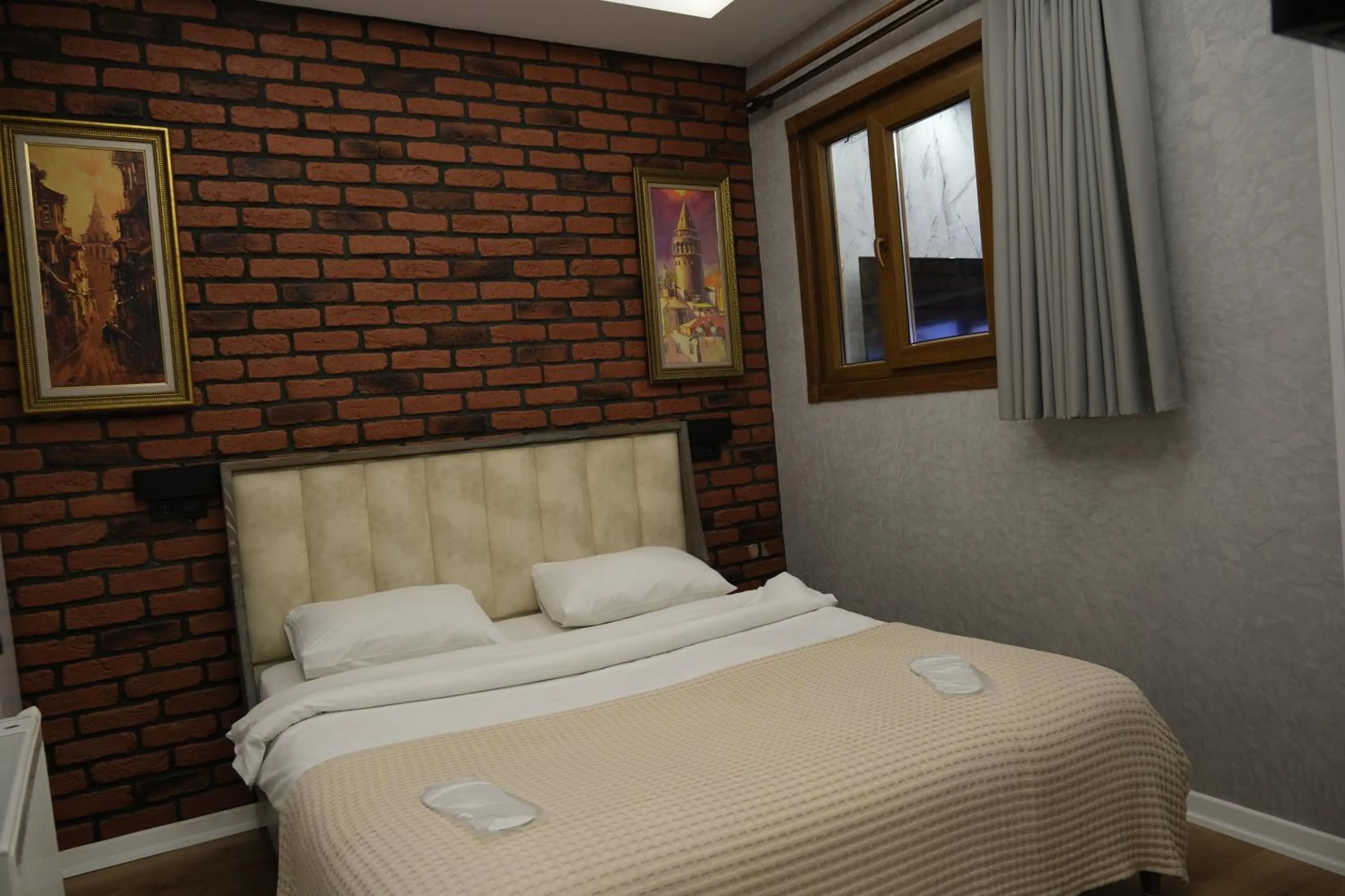 Bed in Taksim Neo Pera Suites
