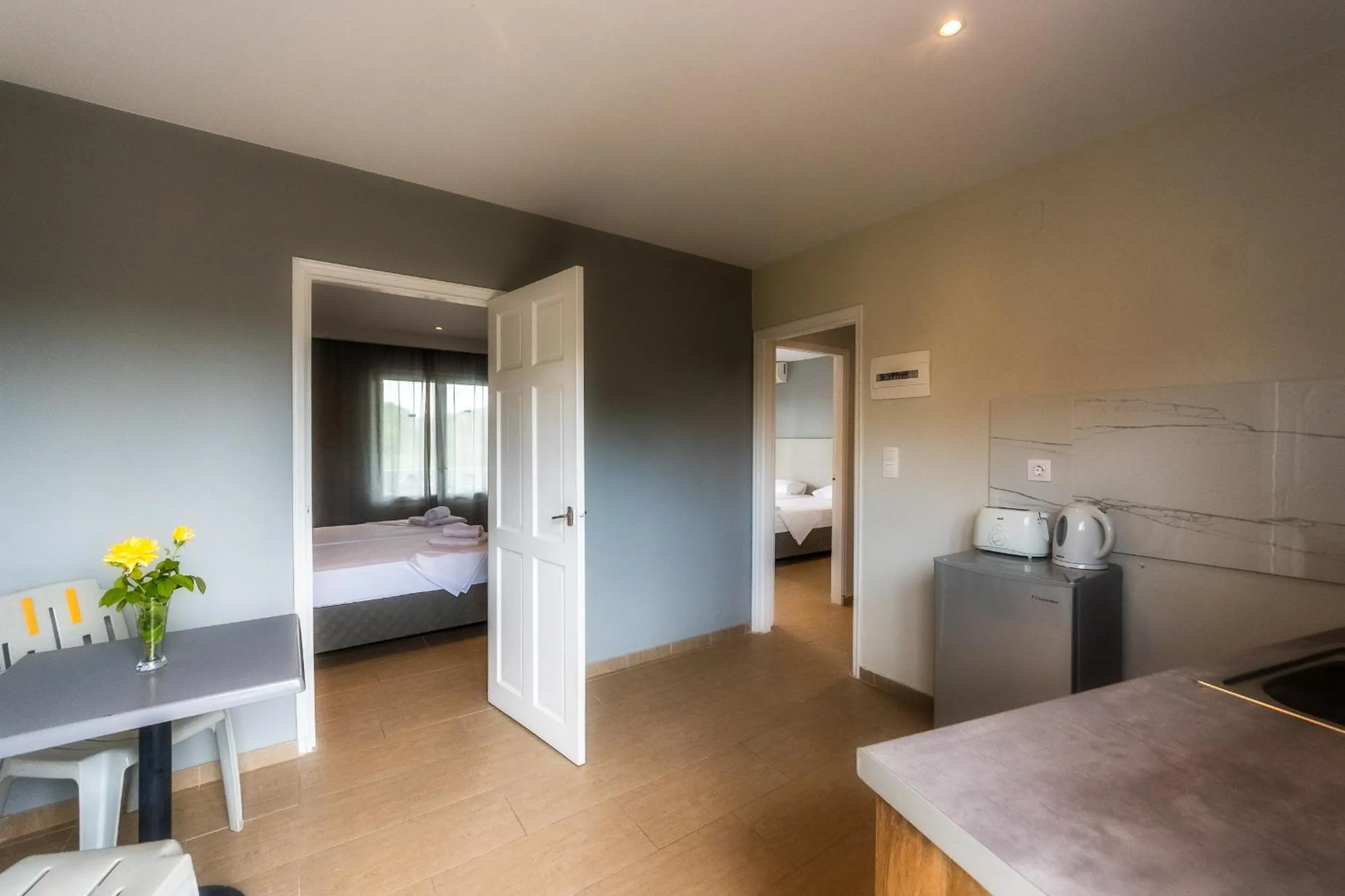 Kitchen or kitchenette, Bed in Nikos Villas