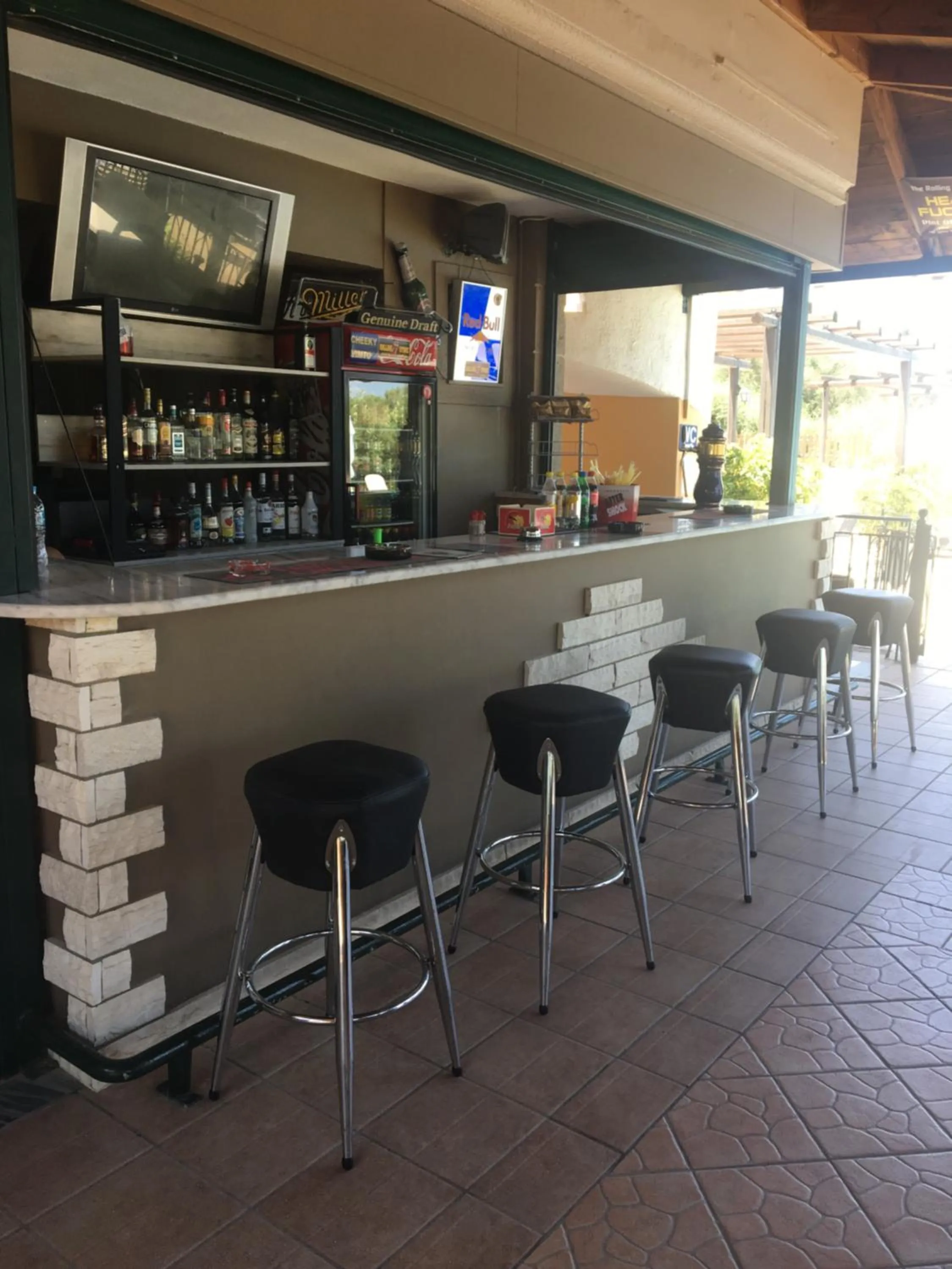 Lounge or bar in Nikos Villas