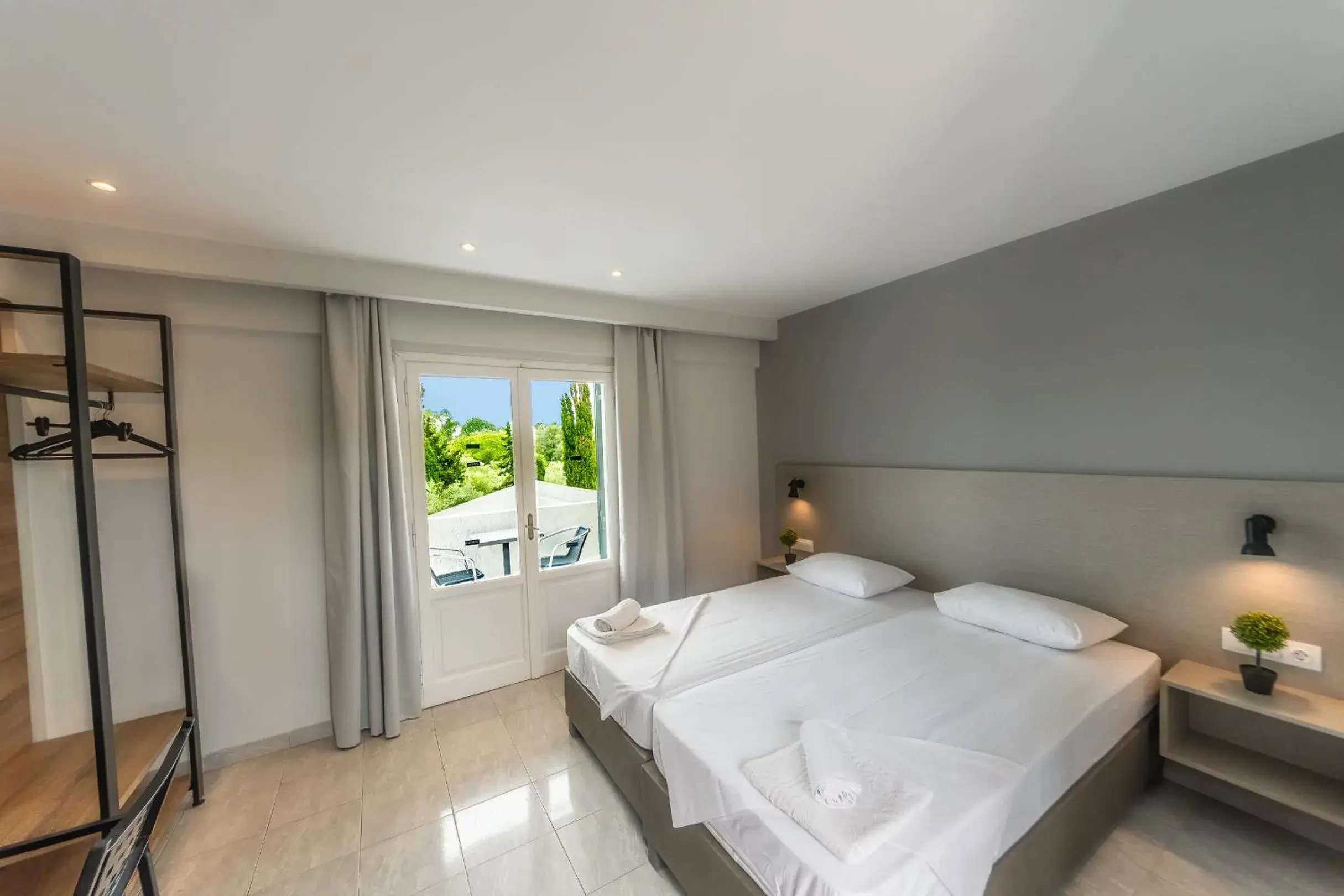 Bed in Nikos Villas Bed in Nikos Villas