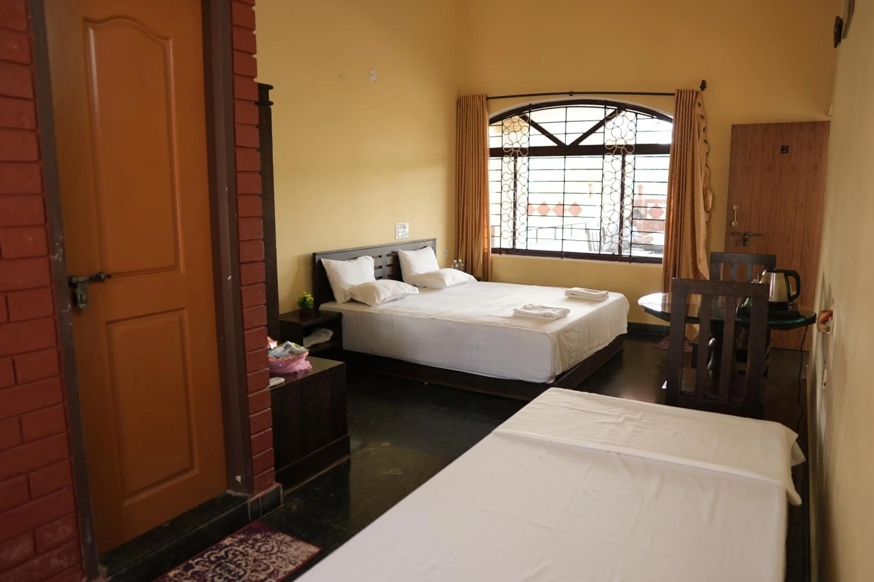 Bedroom, Bed in Manasa Water Park and Resort
