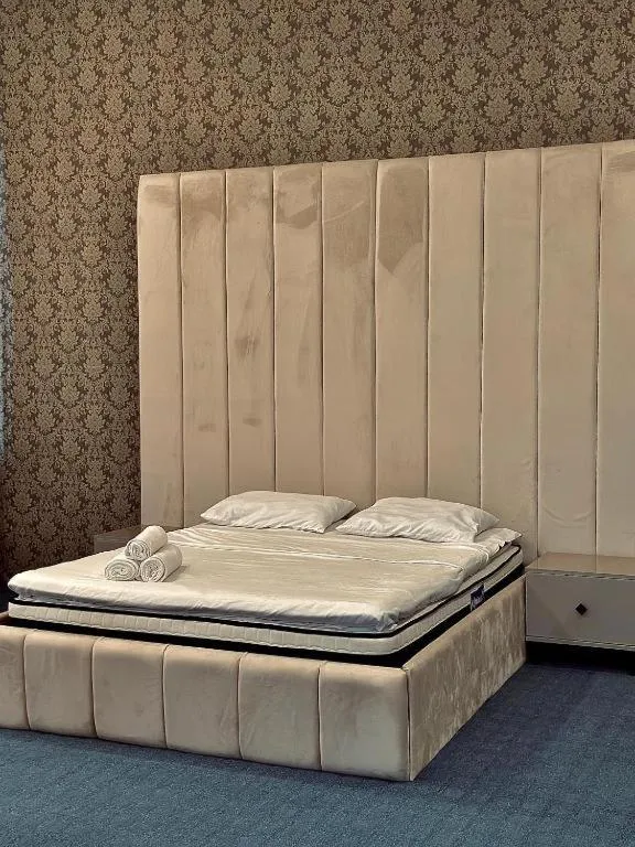 Bed in Olive Garden Baku Hotel