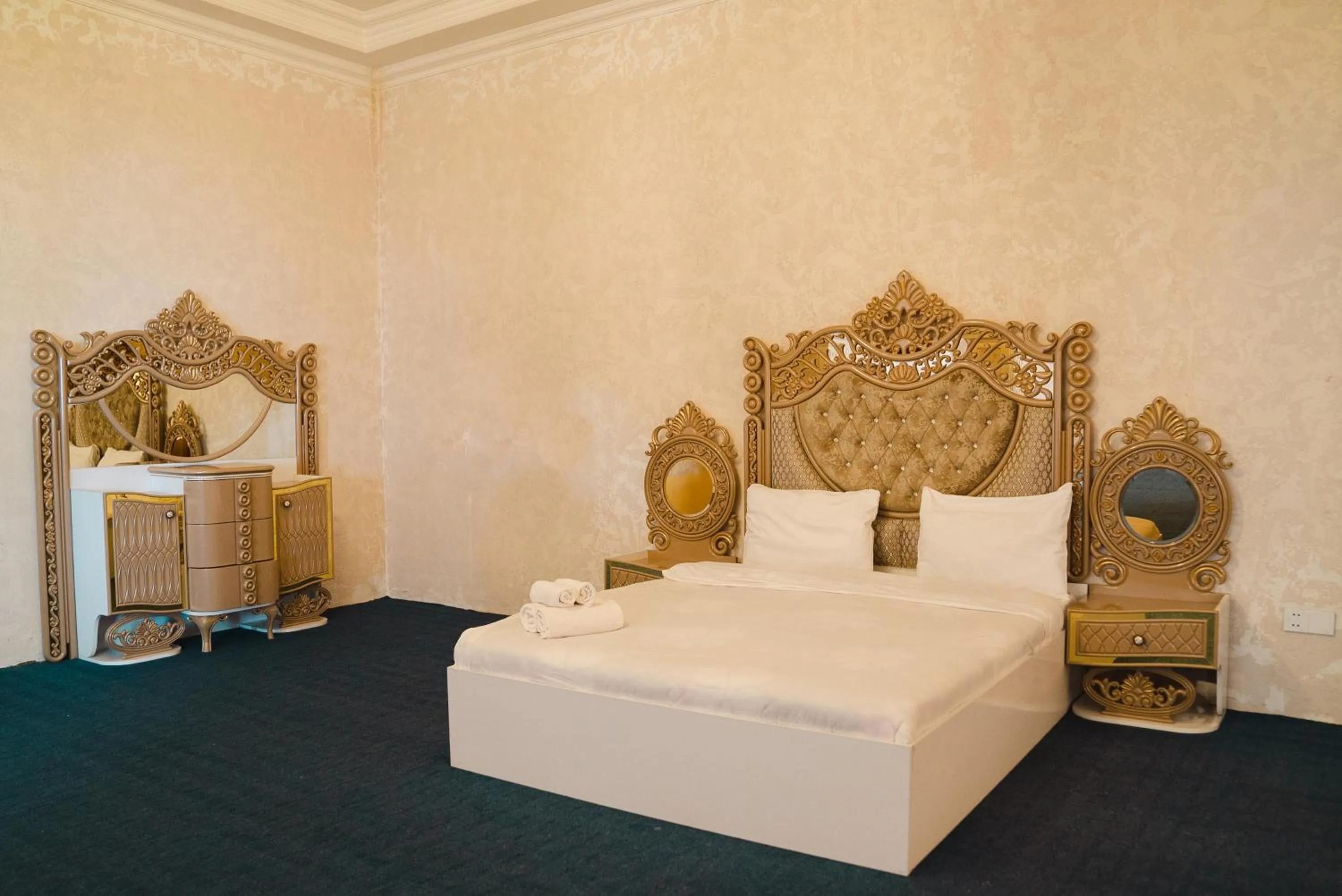 Bed in Olive Garden Baku Hotel