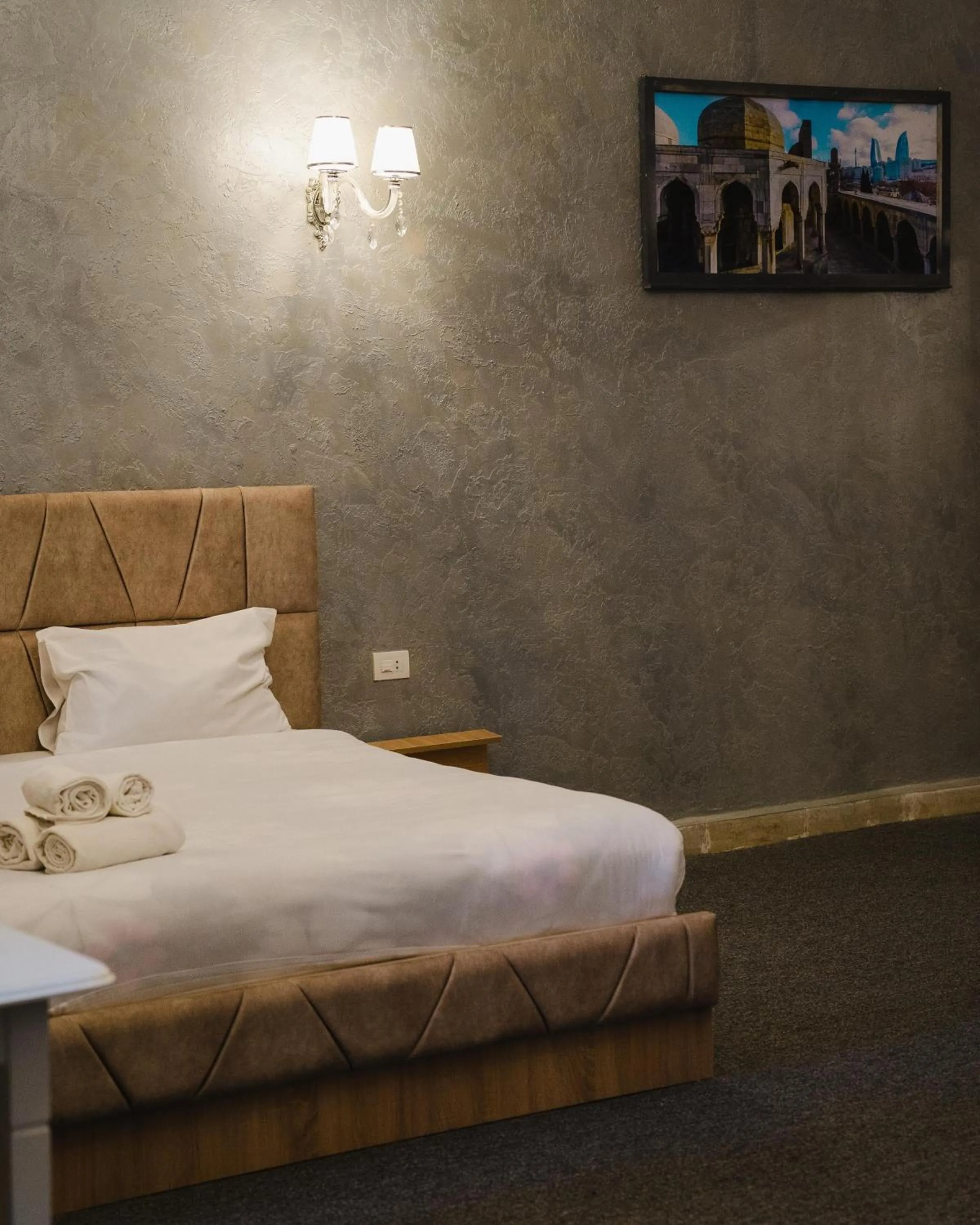 Bed in Olive Garden Baku Hotel