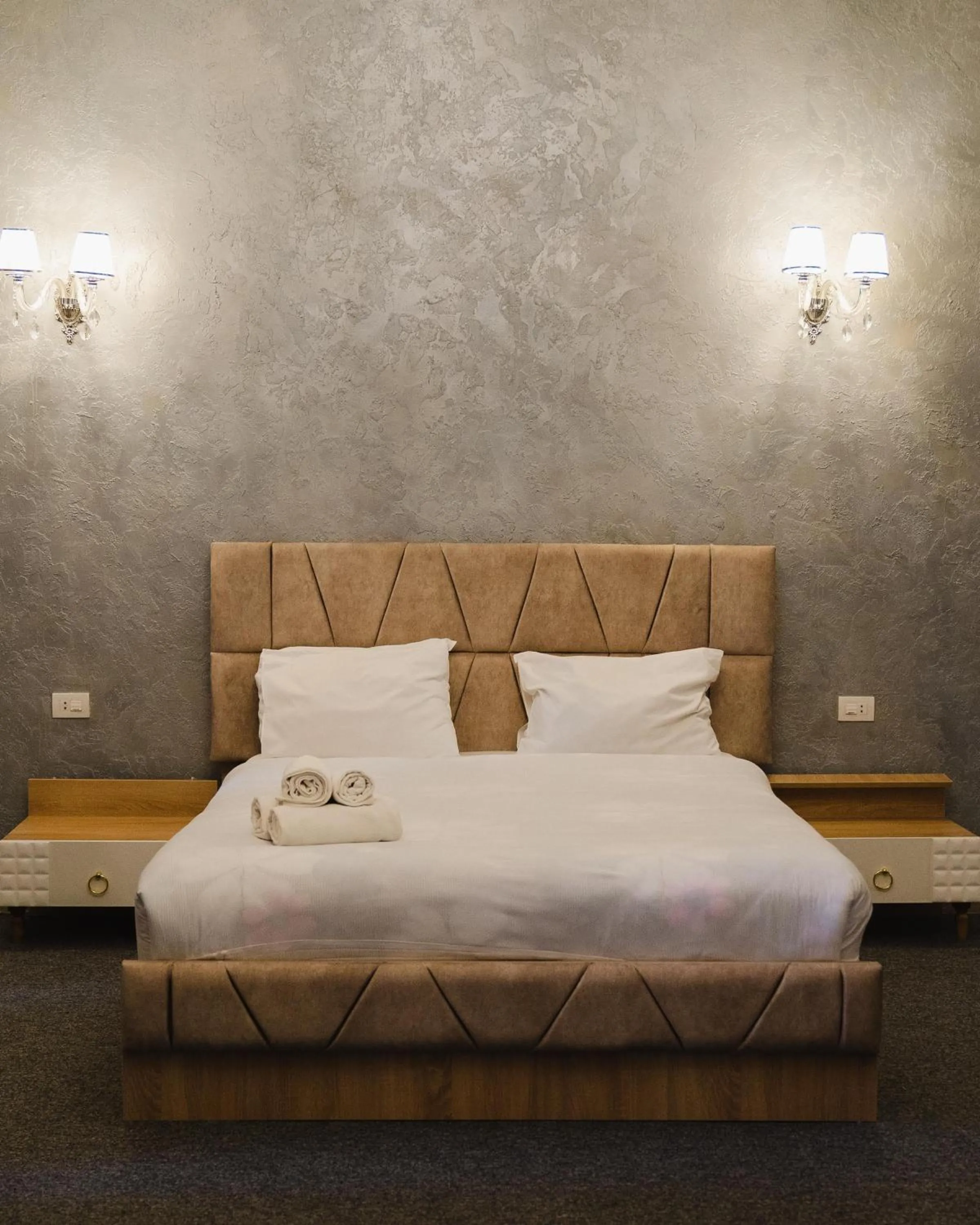 Bed in Olive Garden Baku Hotel