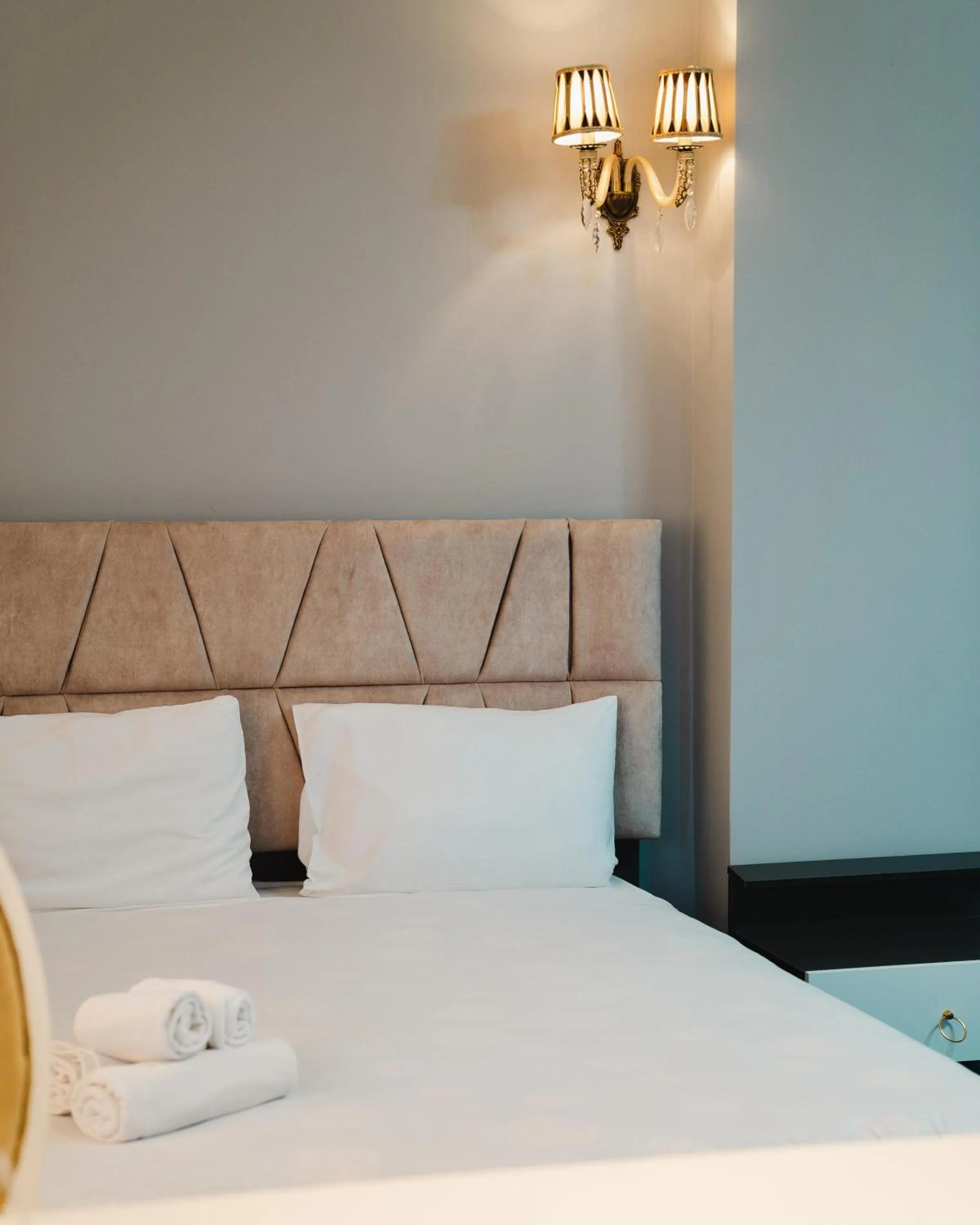 Bed in Olive Garden Baku Hotel