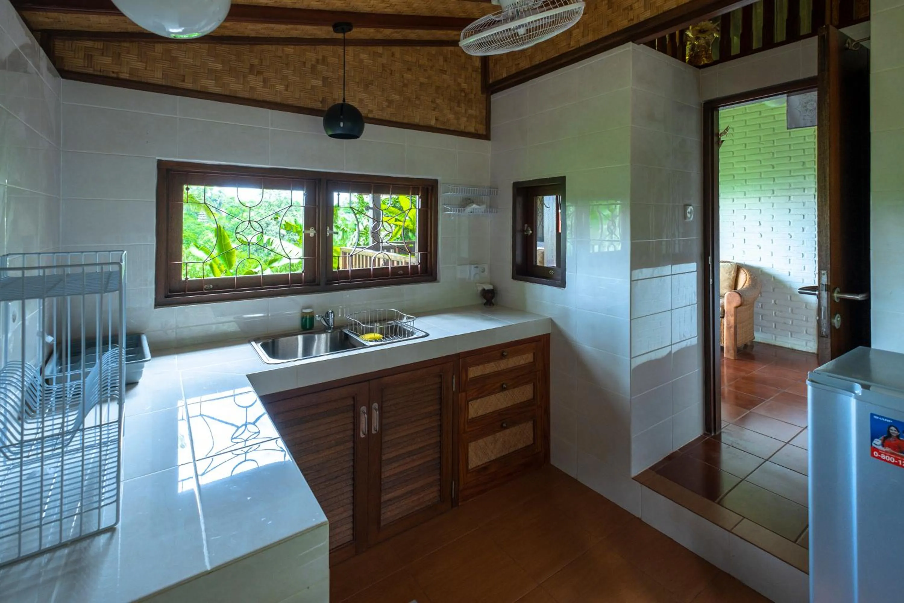 Kitchen or kitchenette in Murni's Houses & Spa
