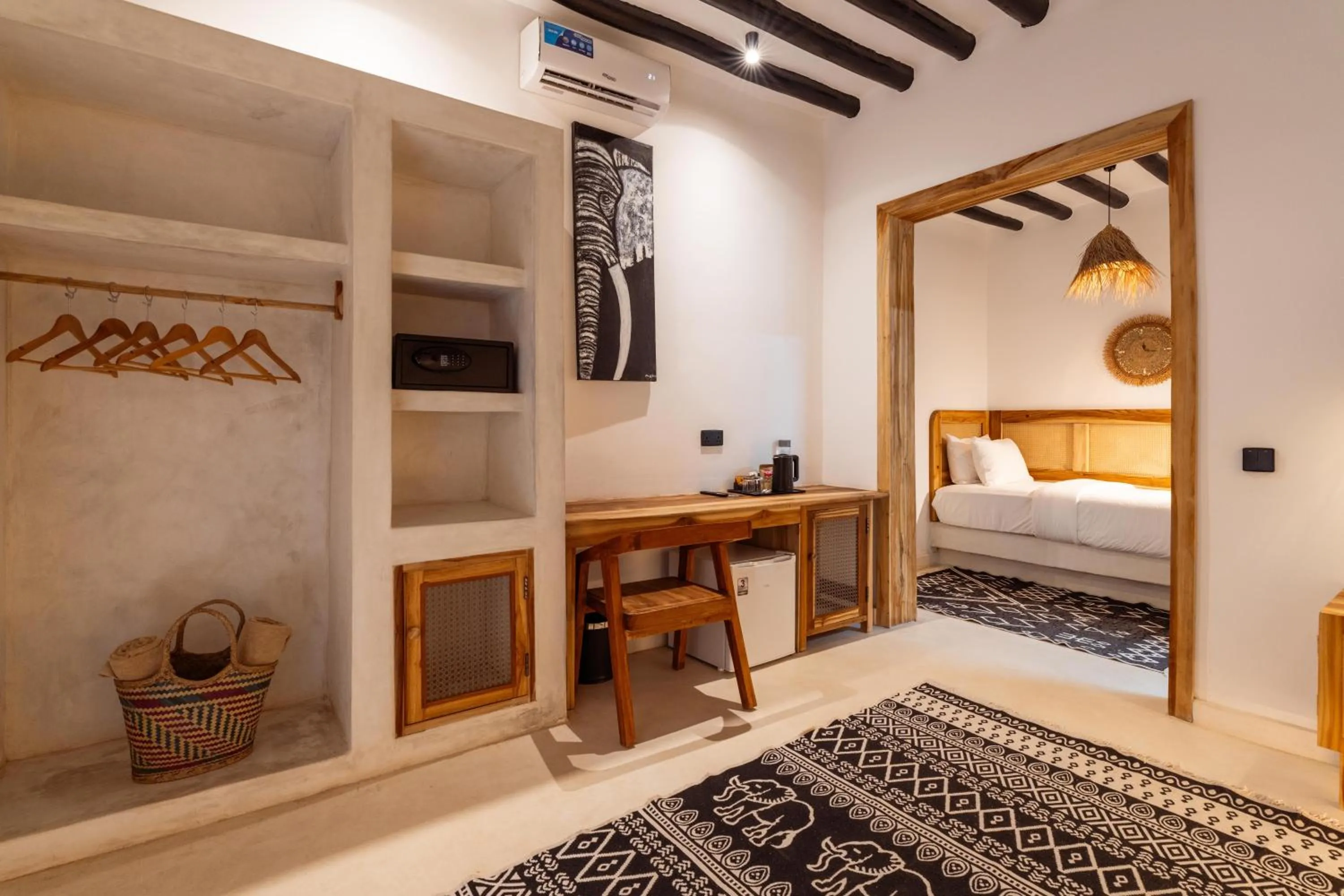 Bed in LUJO Zanzibar Resort