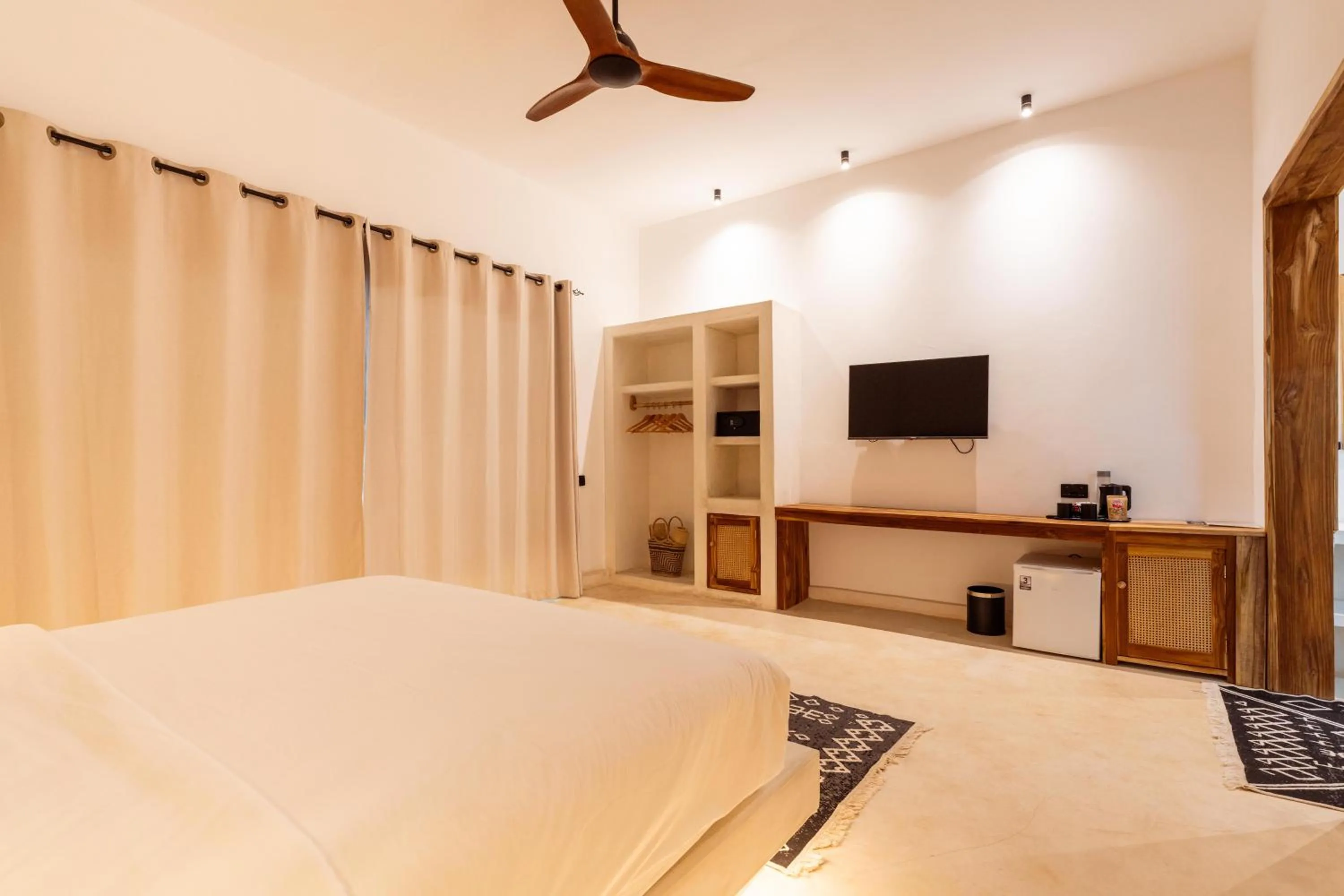Photo of the whole room, Bed in LUJO Zanzibar Resort