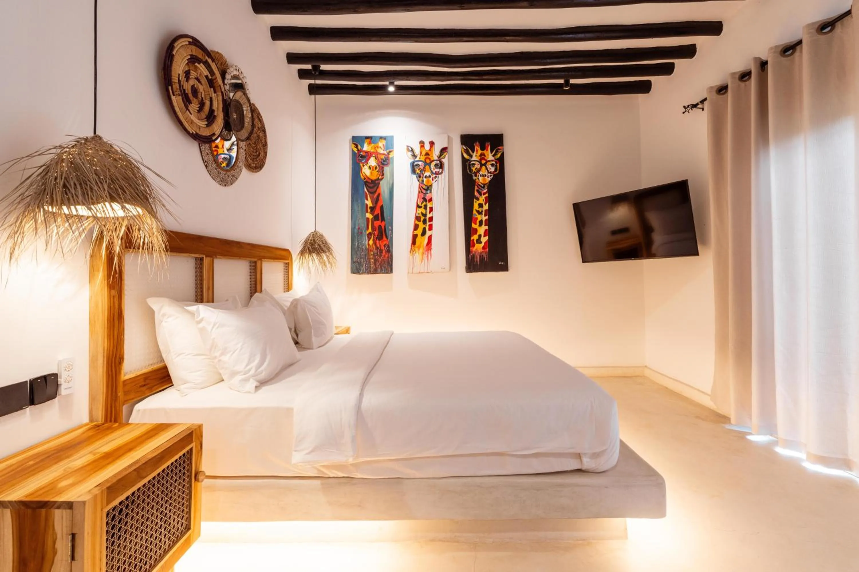 Photo of the whole room, Bed in LUJO Zanzibar Resort