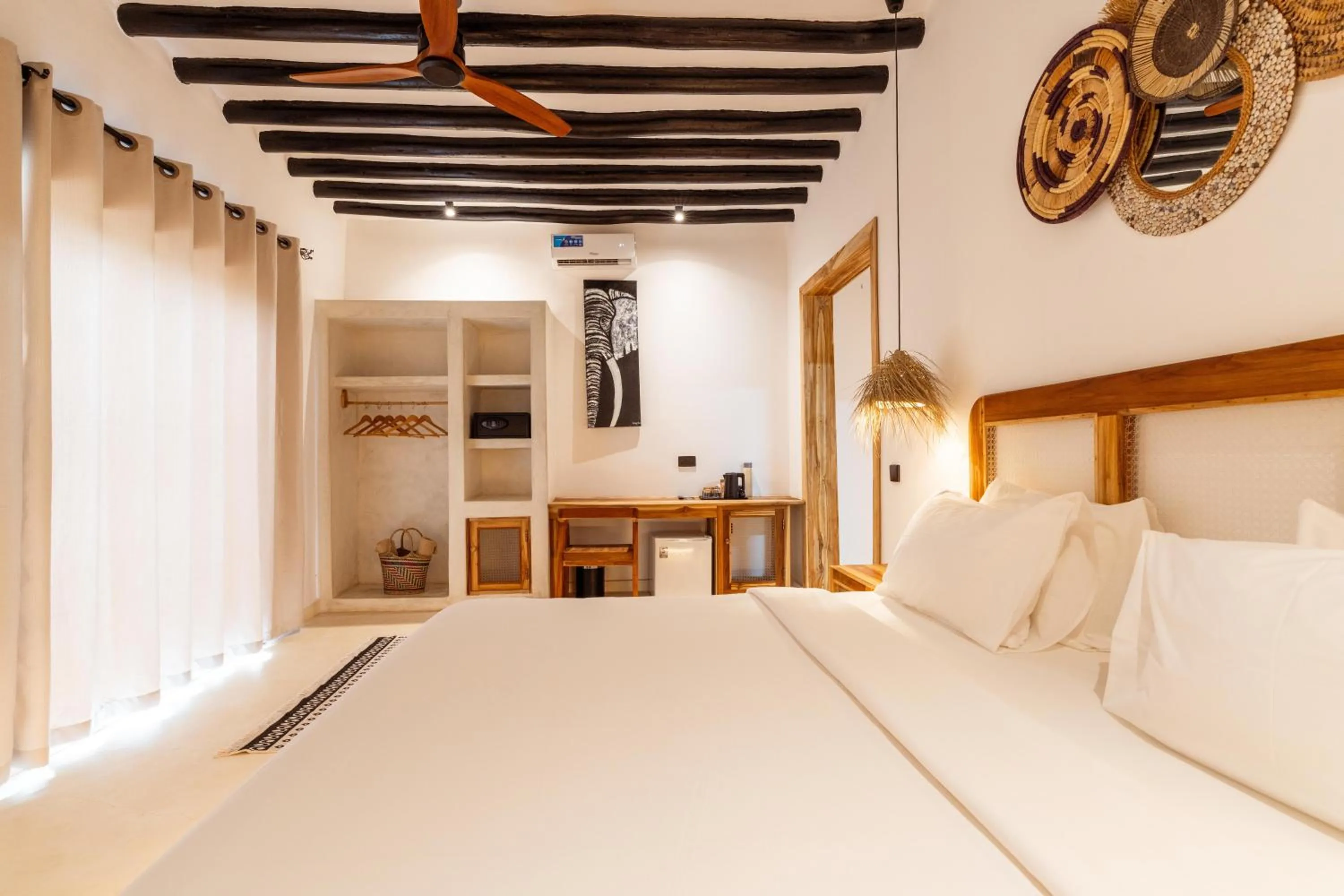 Photo of the whole room, Bed in LUJO Zanzibar Resort