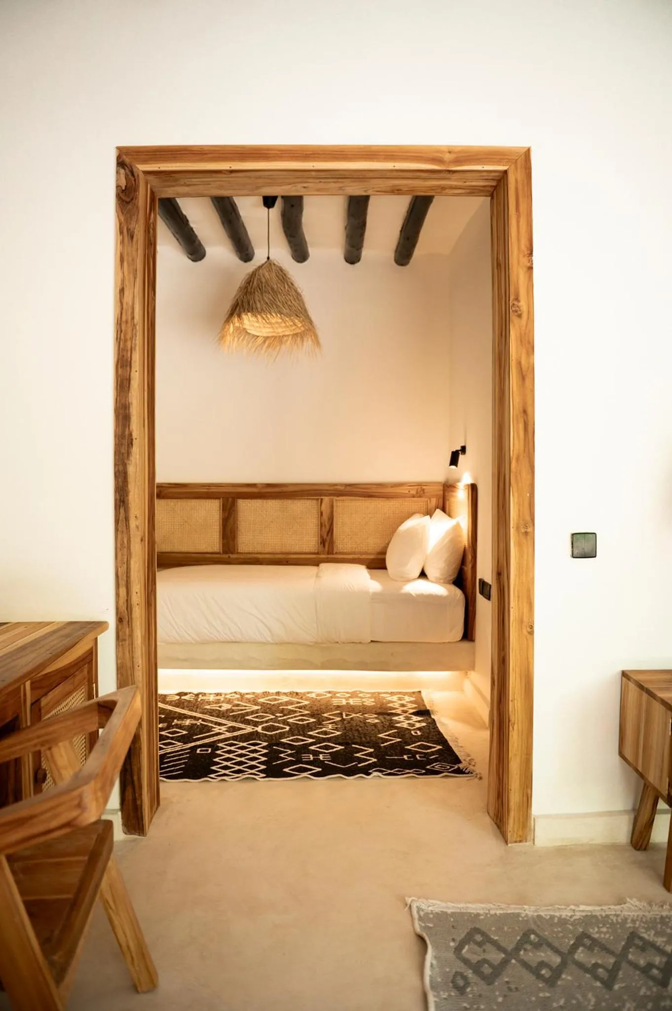 Bed in LUJO Zanzibar Resort