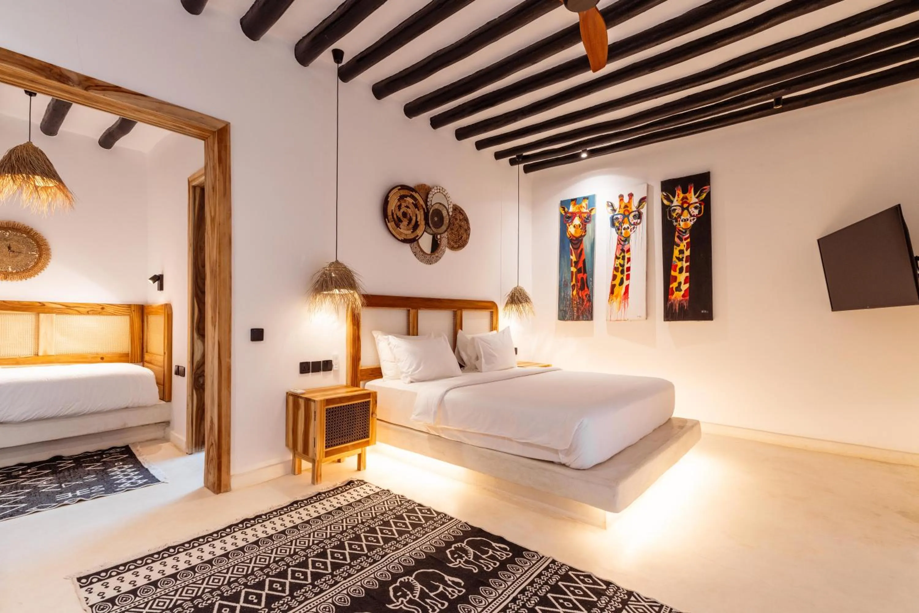 Bed in LUJO Zanzibar Resort