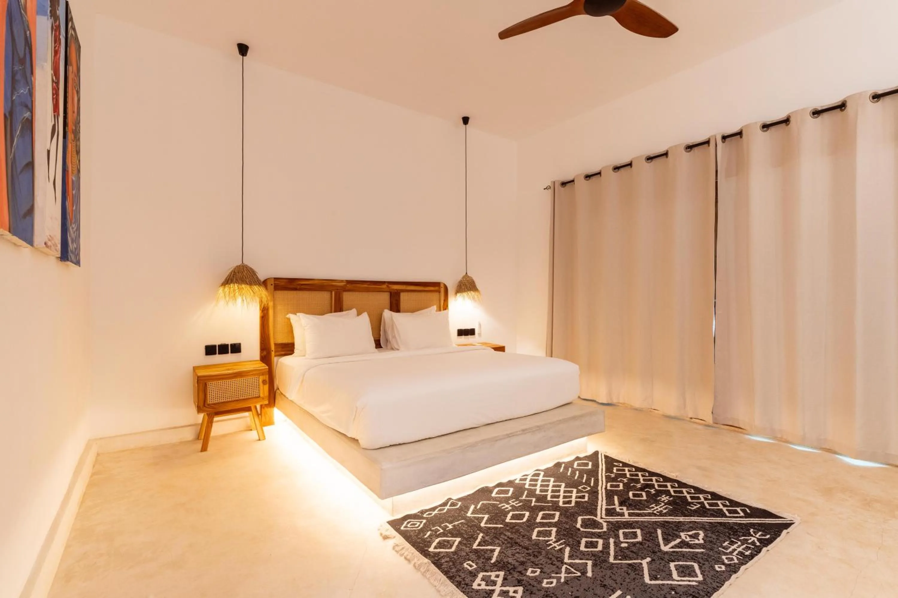 Bed in LUJO Zanzibar Resort