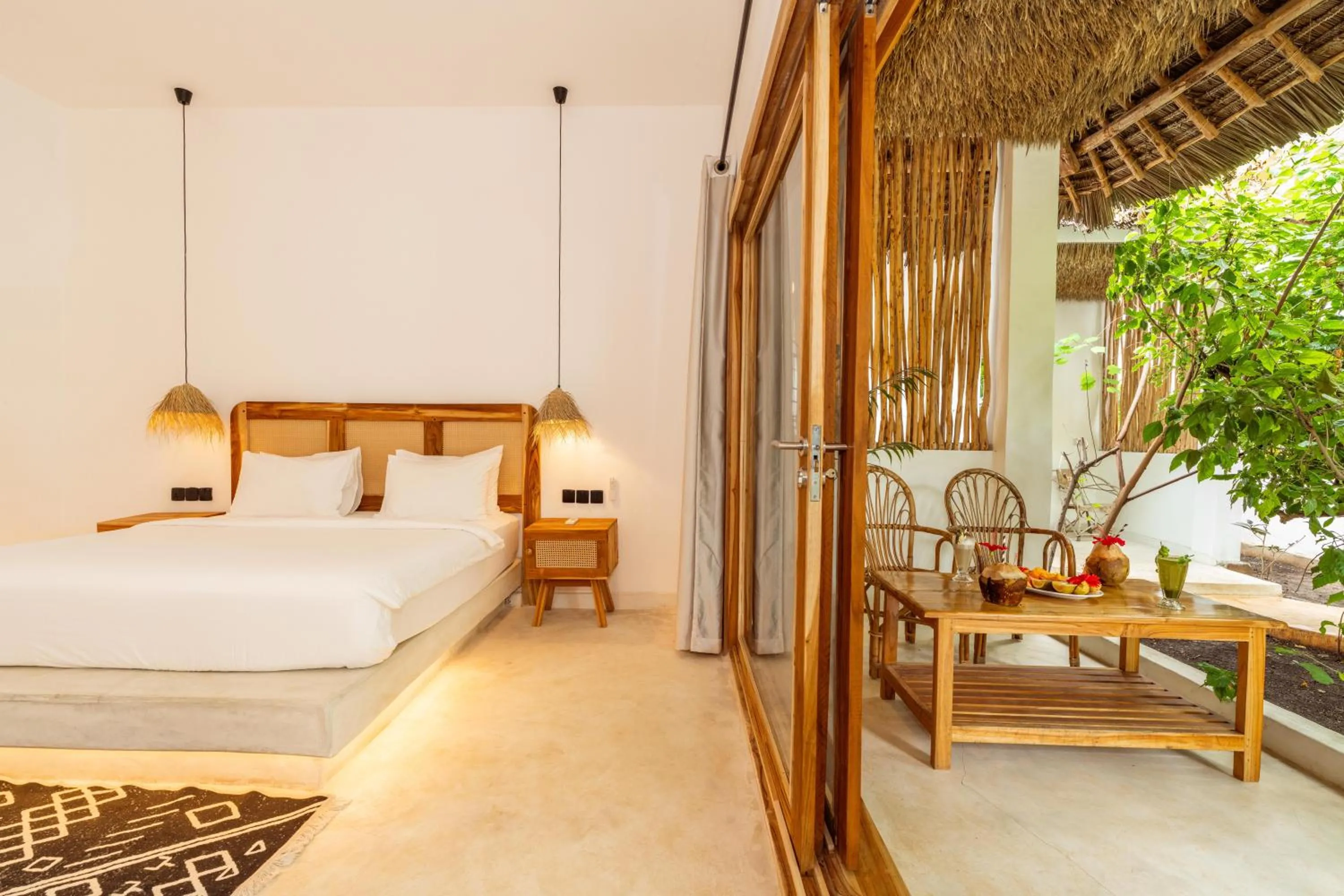 Bed in LUJO Zanzibar Resort