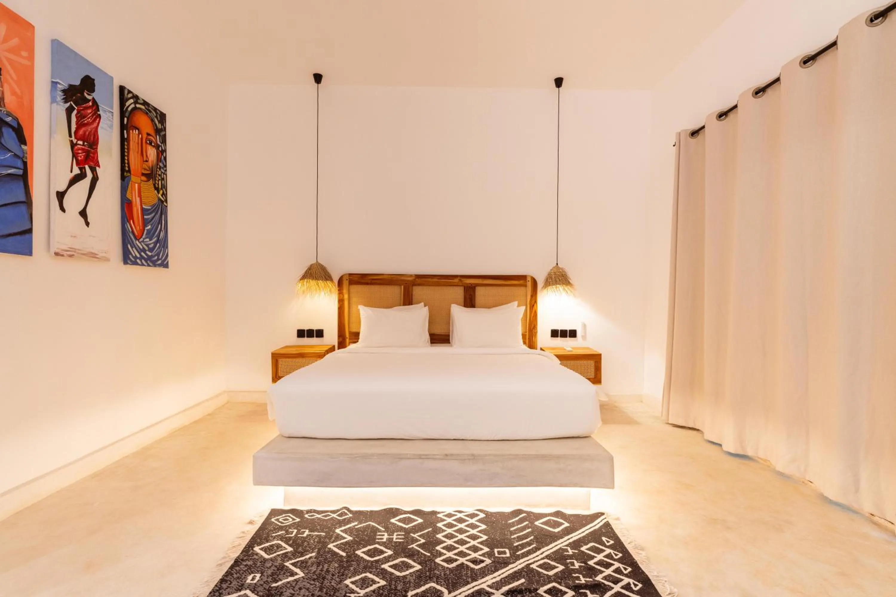 Bed in LUJO Zanzibar Resort