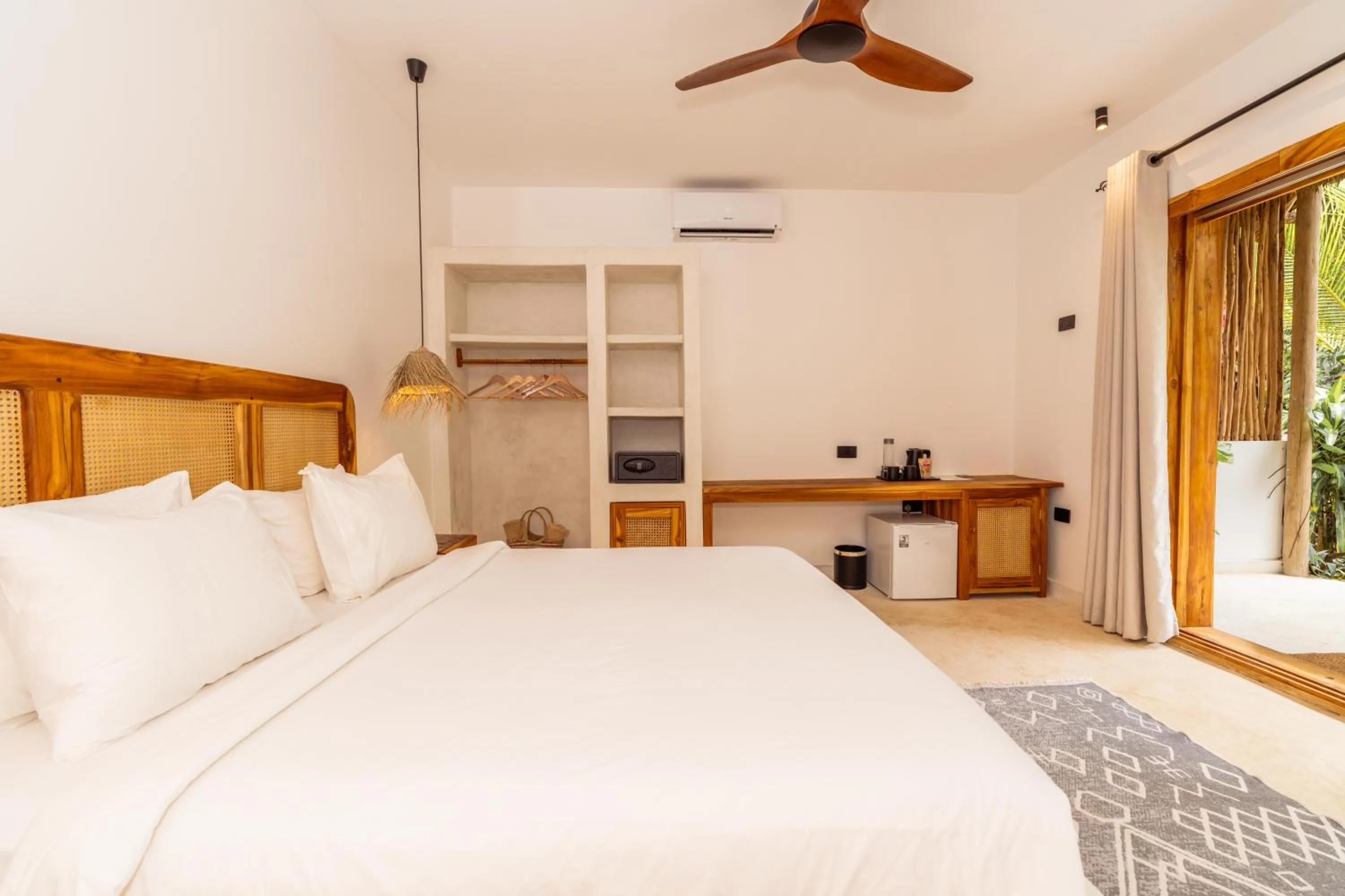 Photo of the whole room, Bed in LUJO Zanzibar Resort