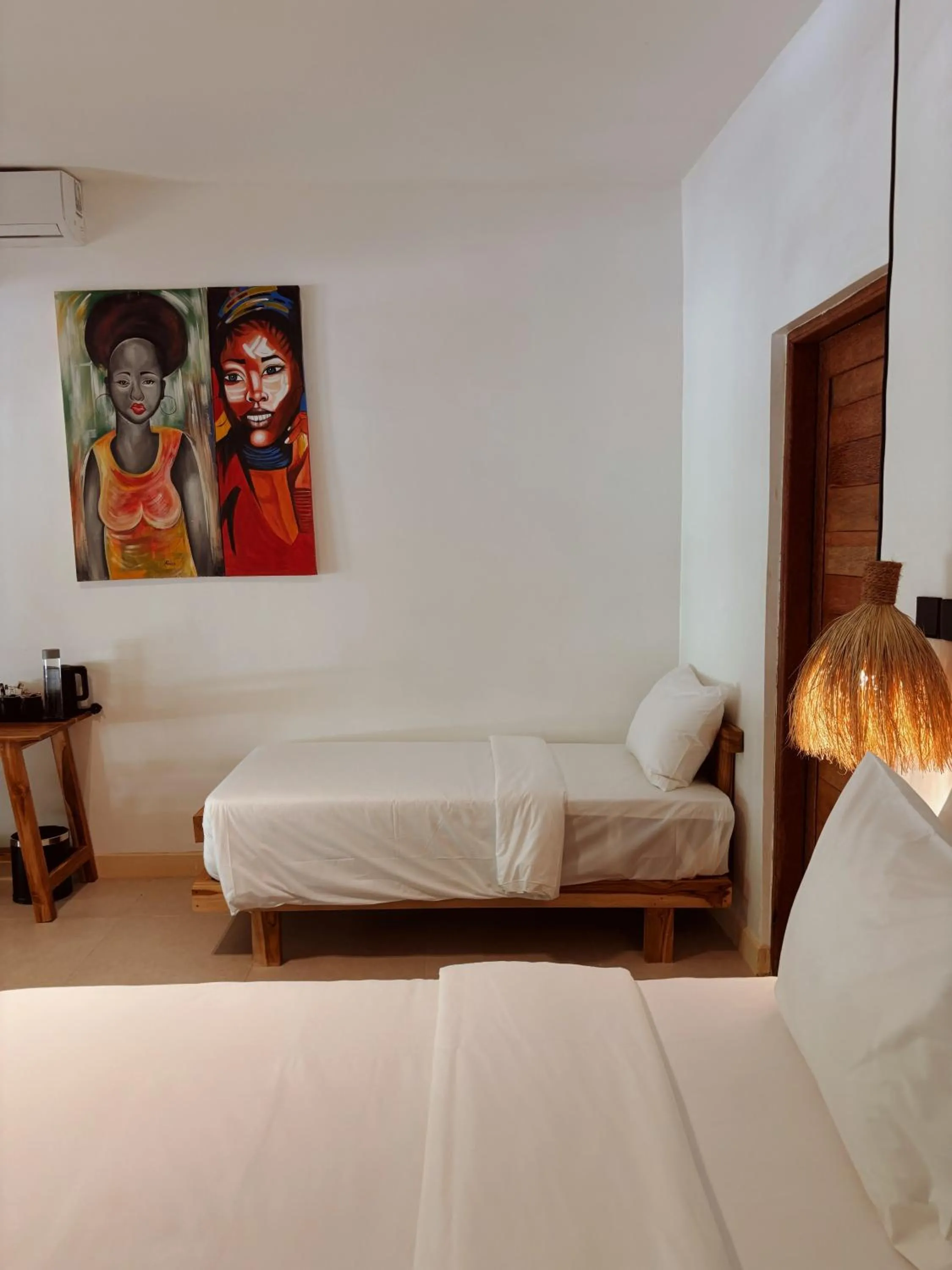 Bed in LUJO Zanzibar Resort