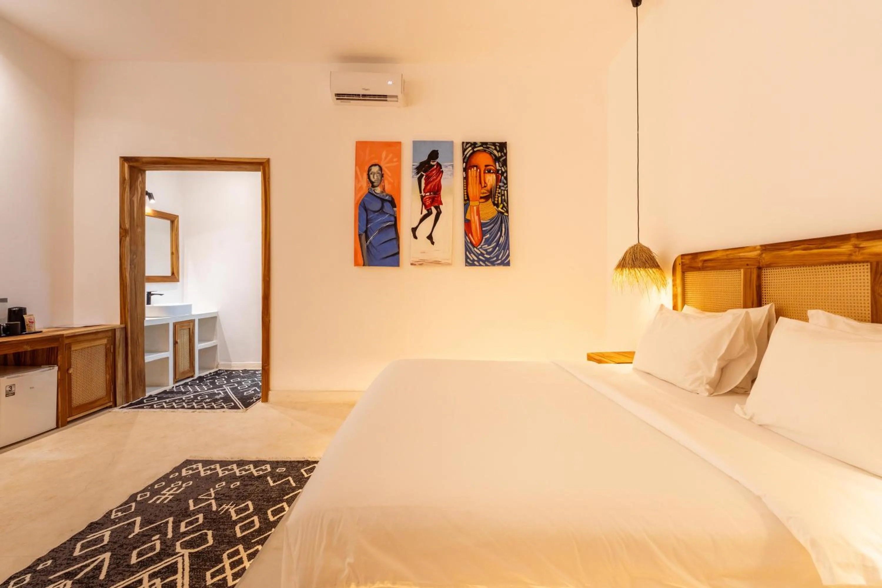Bed in LUJO Zanzibar Resort