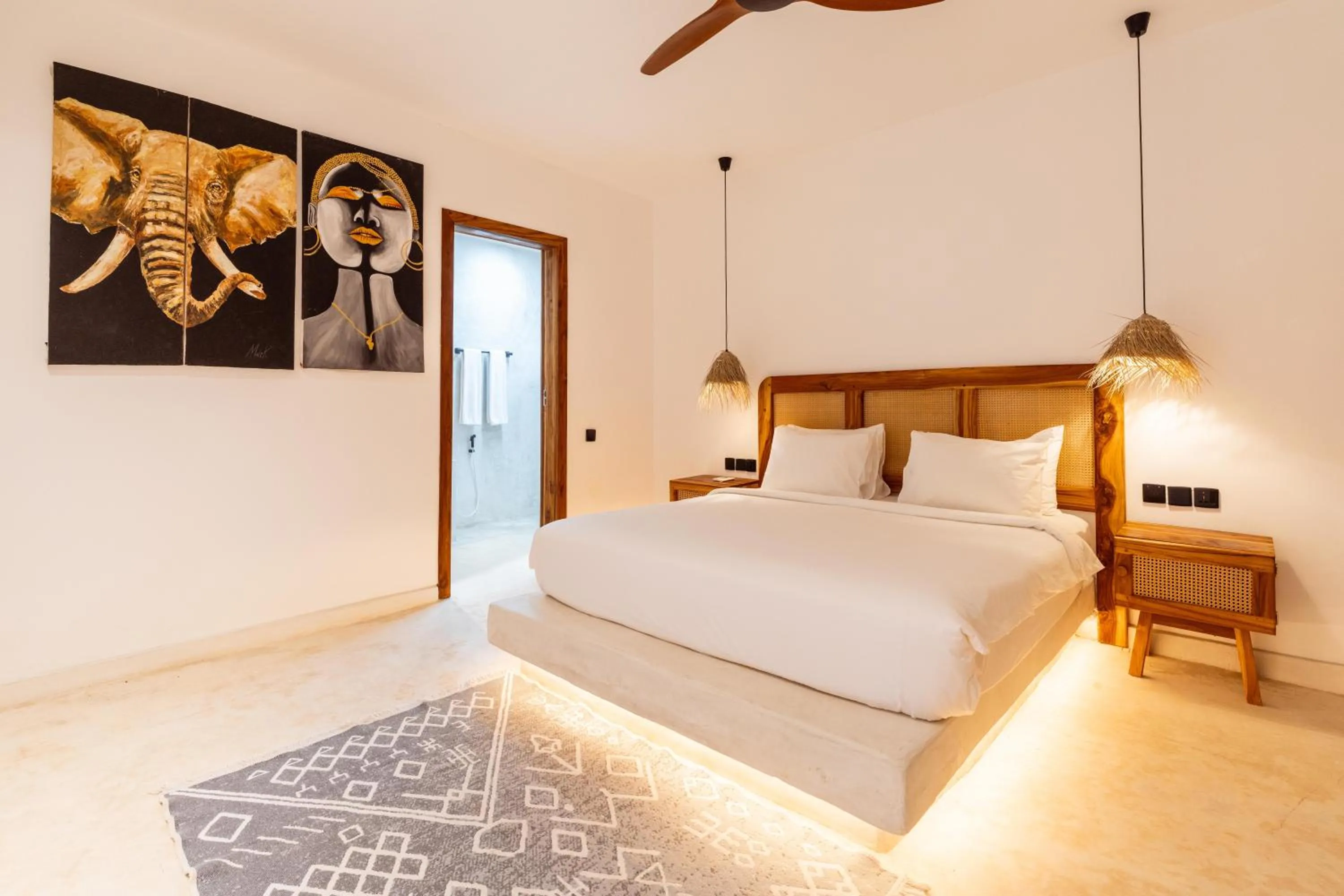 Bed in LUJO Zanzibar Resort