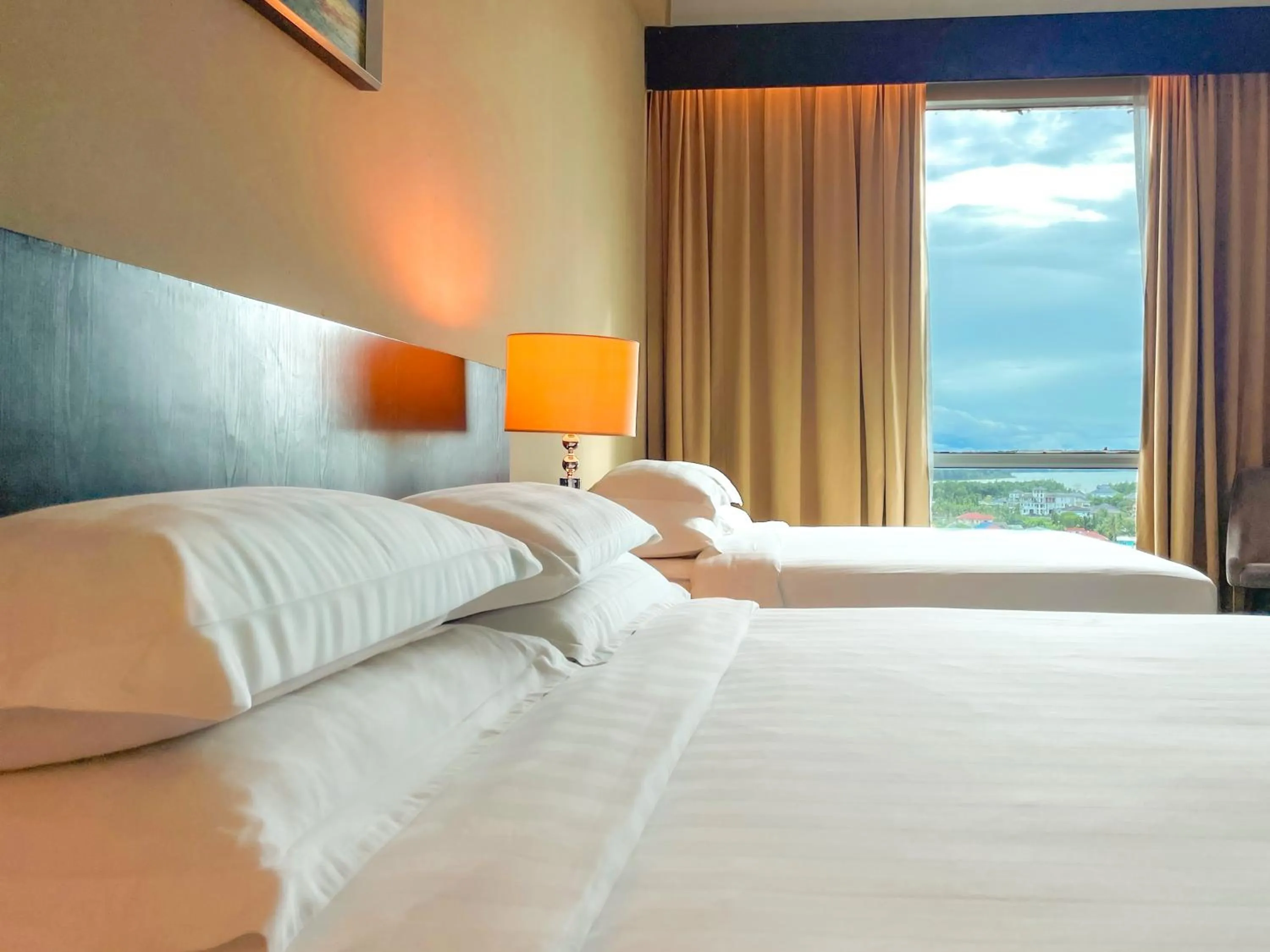 Bed in Pan Borneo Hotel Kota Kinabalu