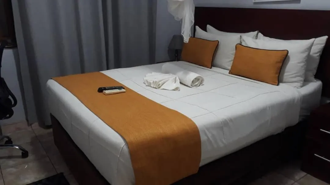 Bed in Plateau Guest House