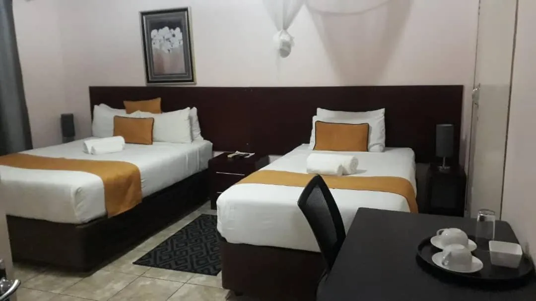 Bed in Plateau Guest House