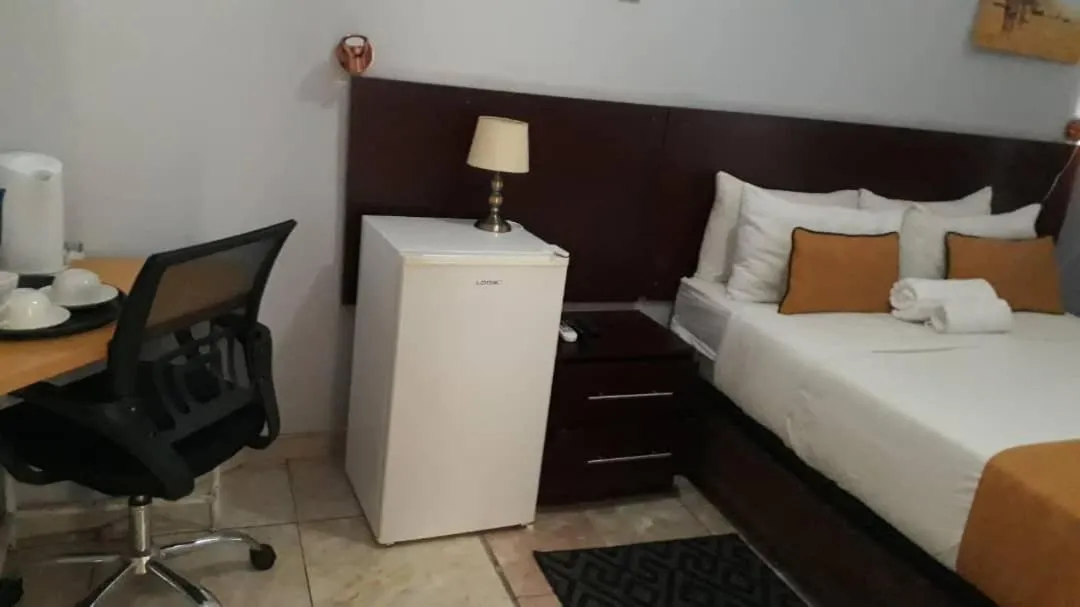 Bed in Plateau Guest House