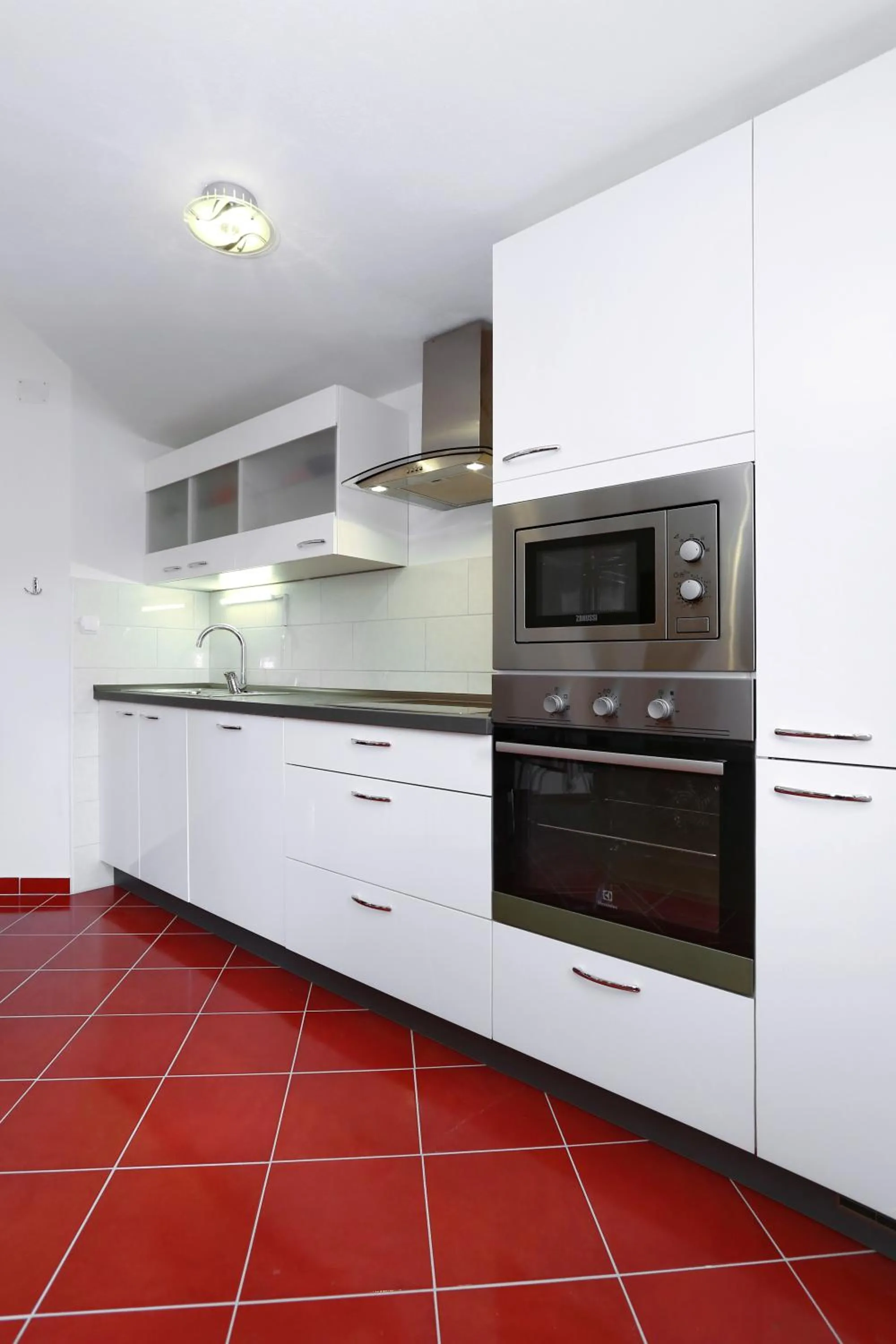 Kitchen or kitchenette in Apartments Maslina Božava