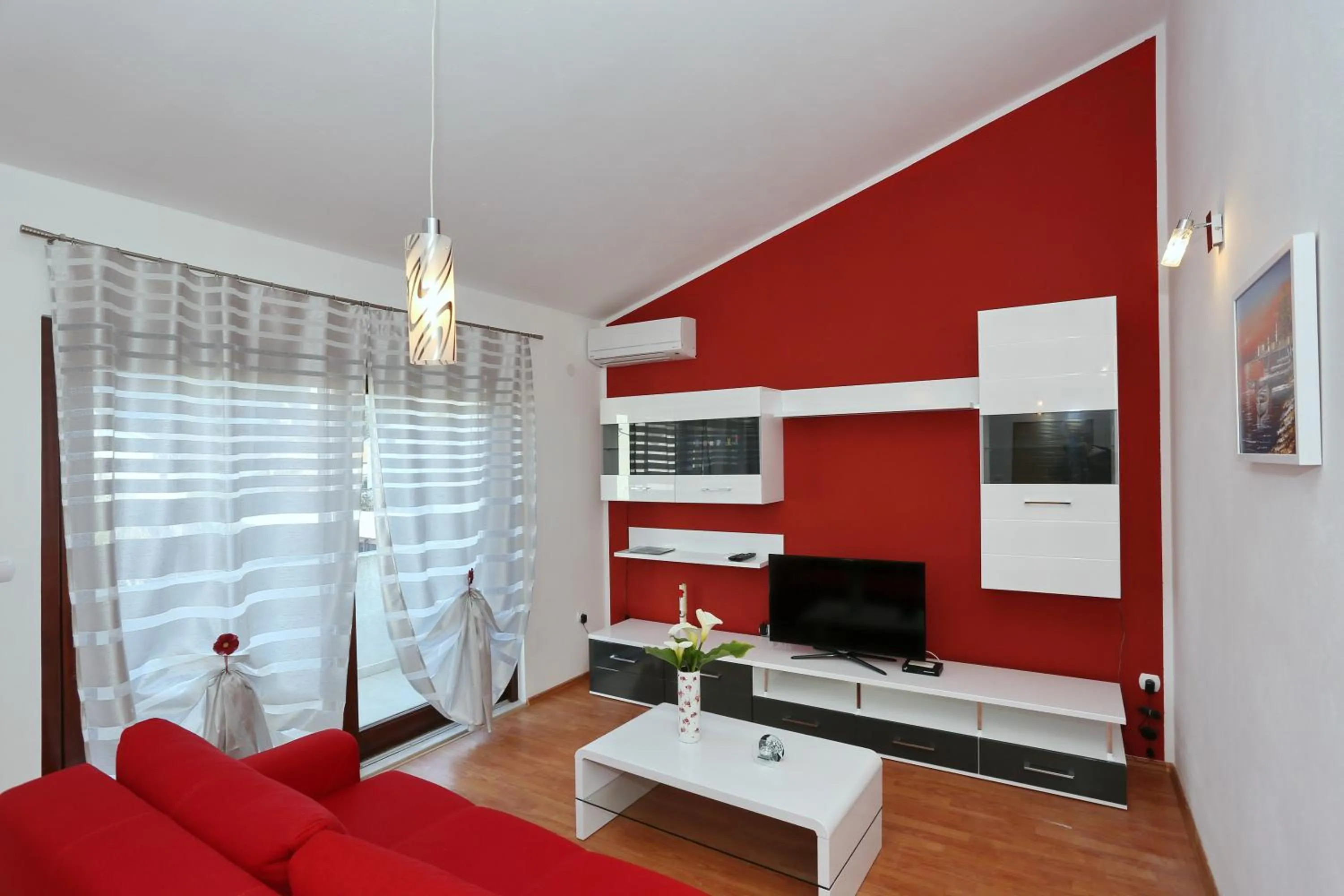 TV and multimedia in Apartments Maslina Božava