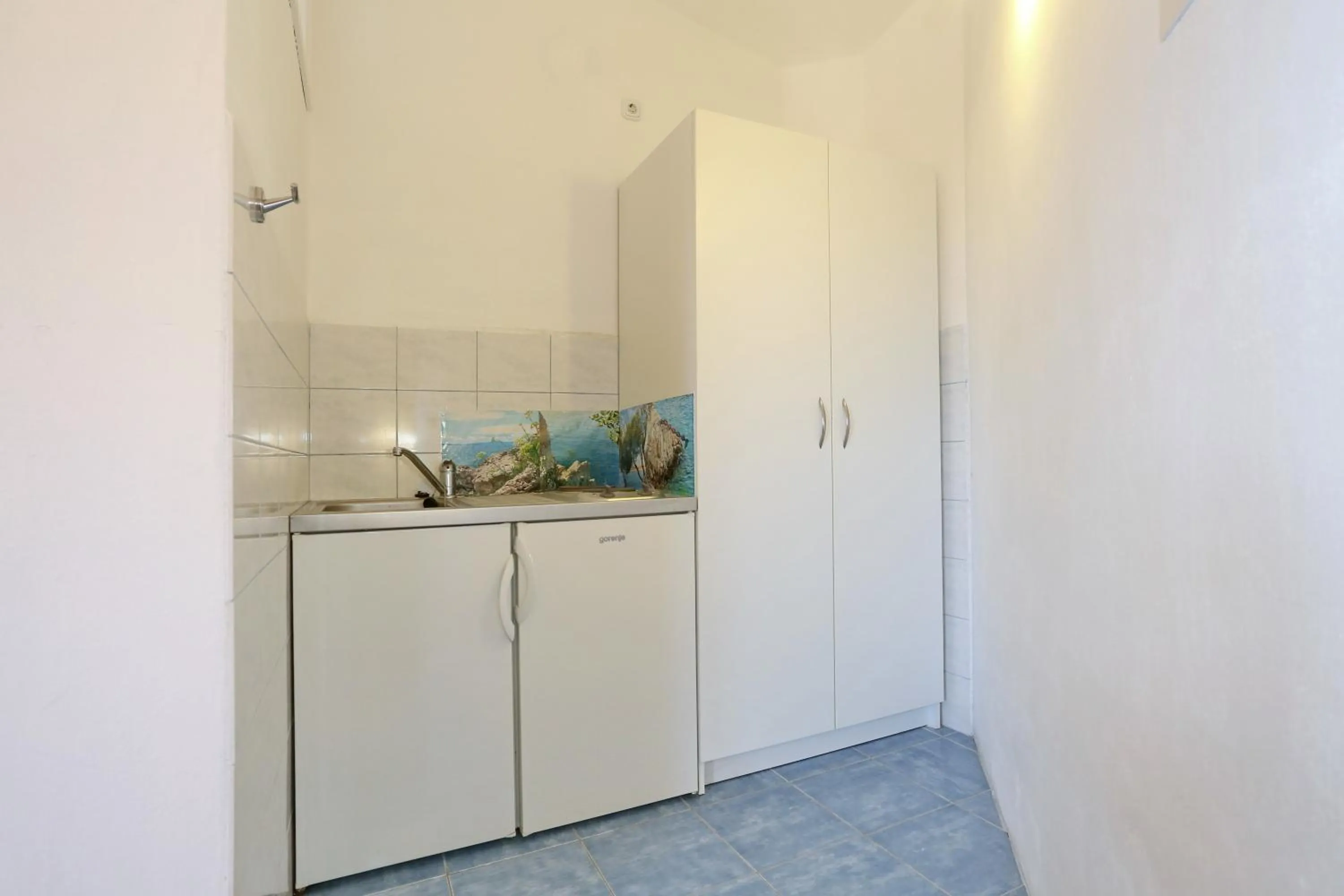 Kitchen or kitchenette in Apartments Maslina Božava
